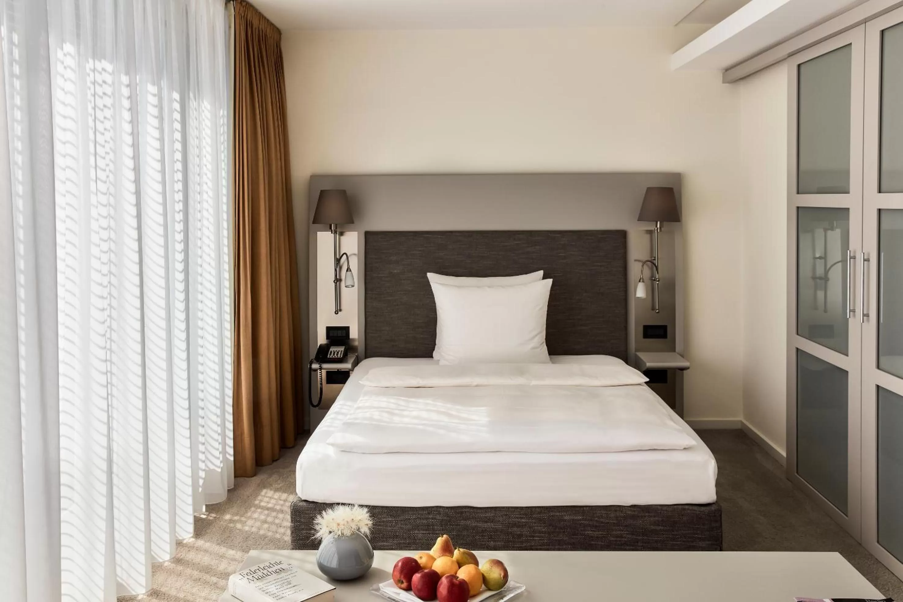 Photo of the whole room, Bed in The Mandala Berlin, a Member of Design Hotels