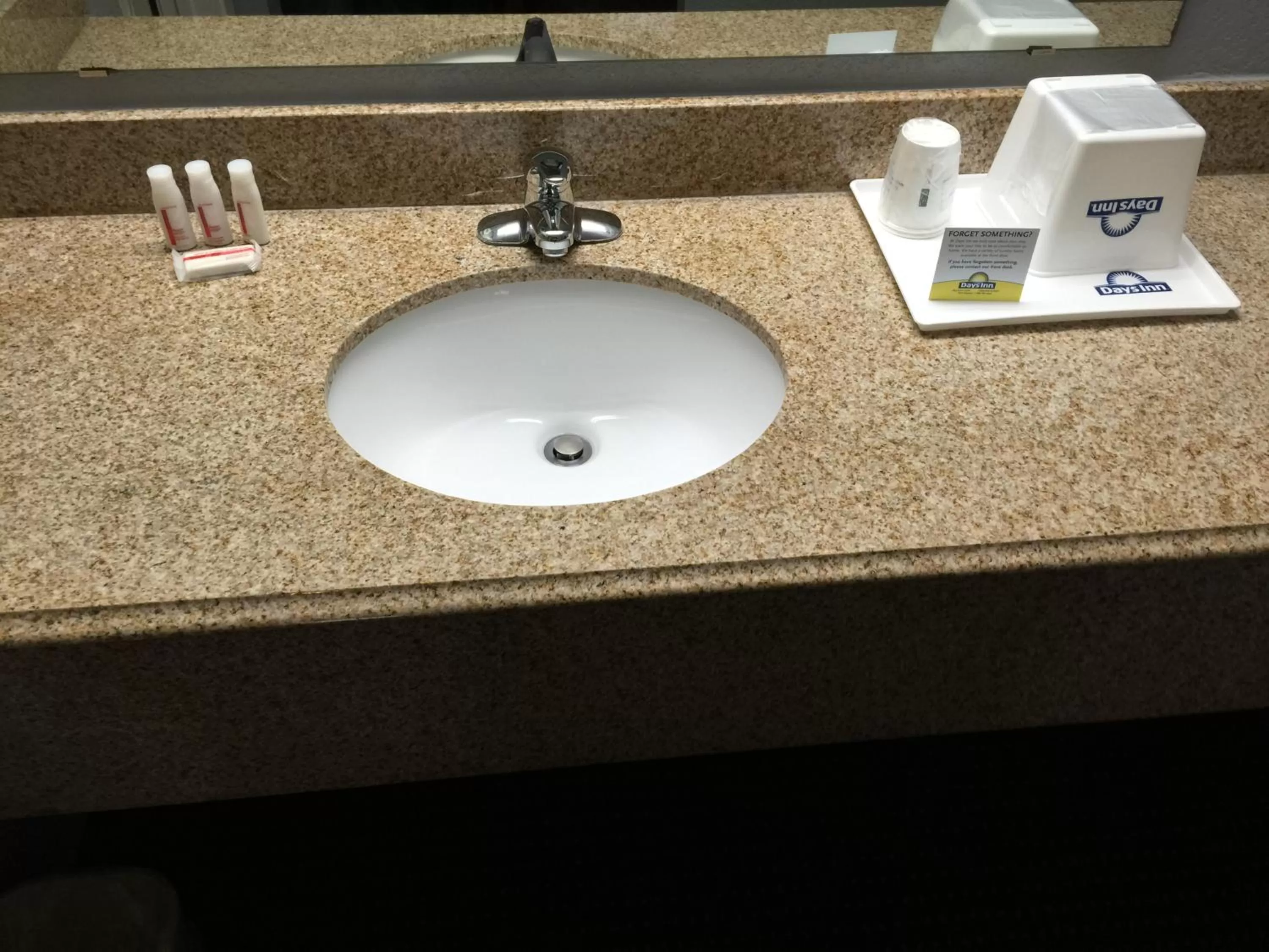 Bathroom in Days Inn by Wyndham Austin/University/Downtown