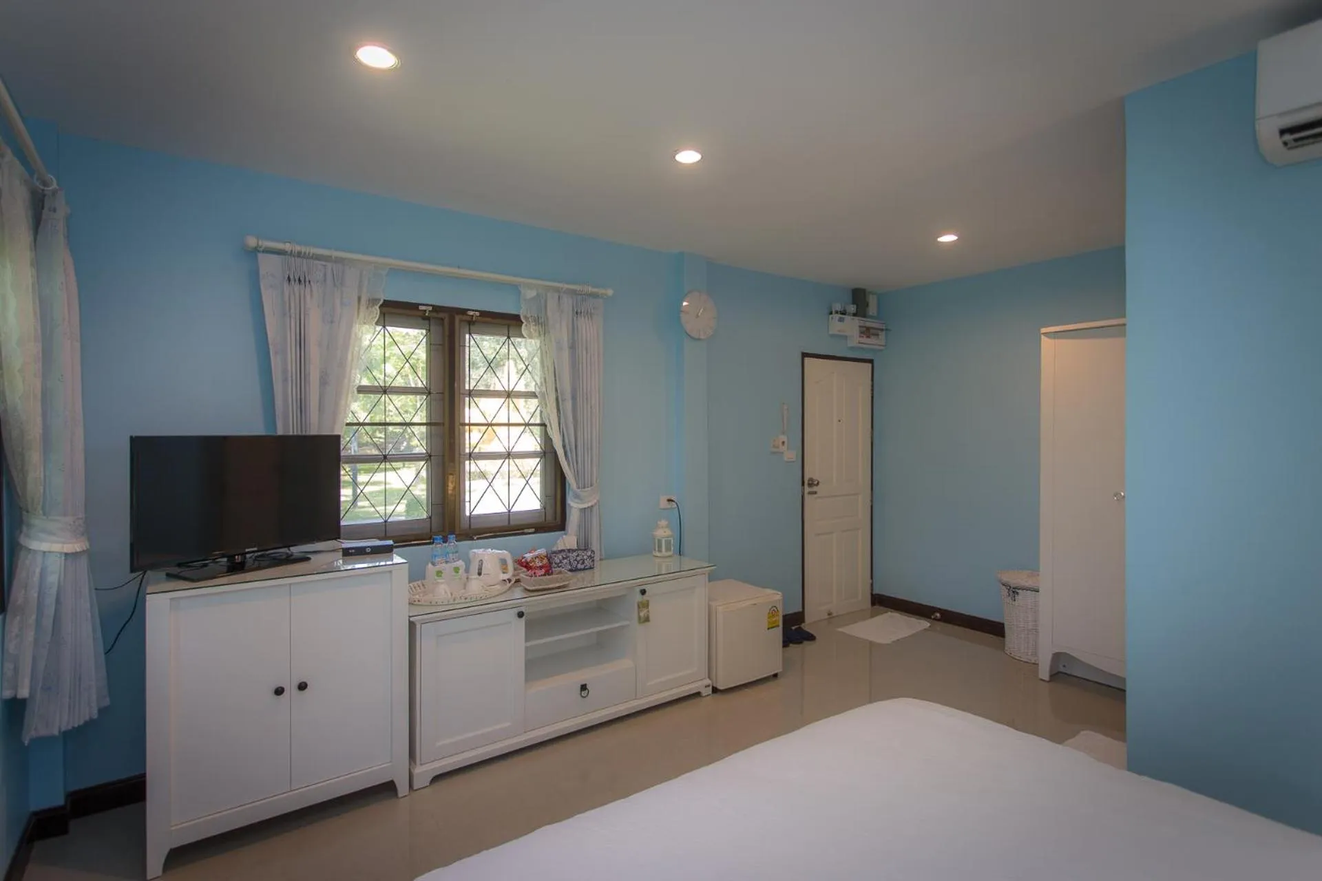 Bed in Thararin Villa