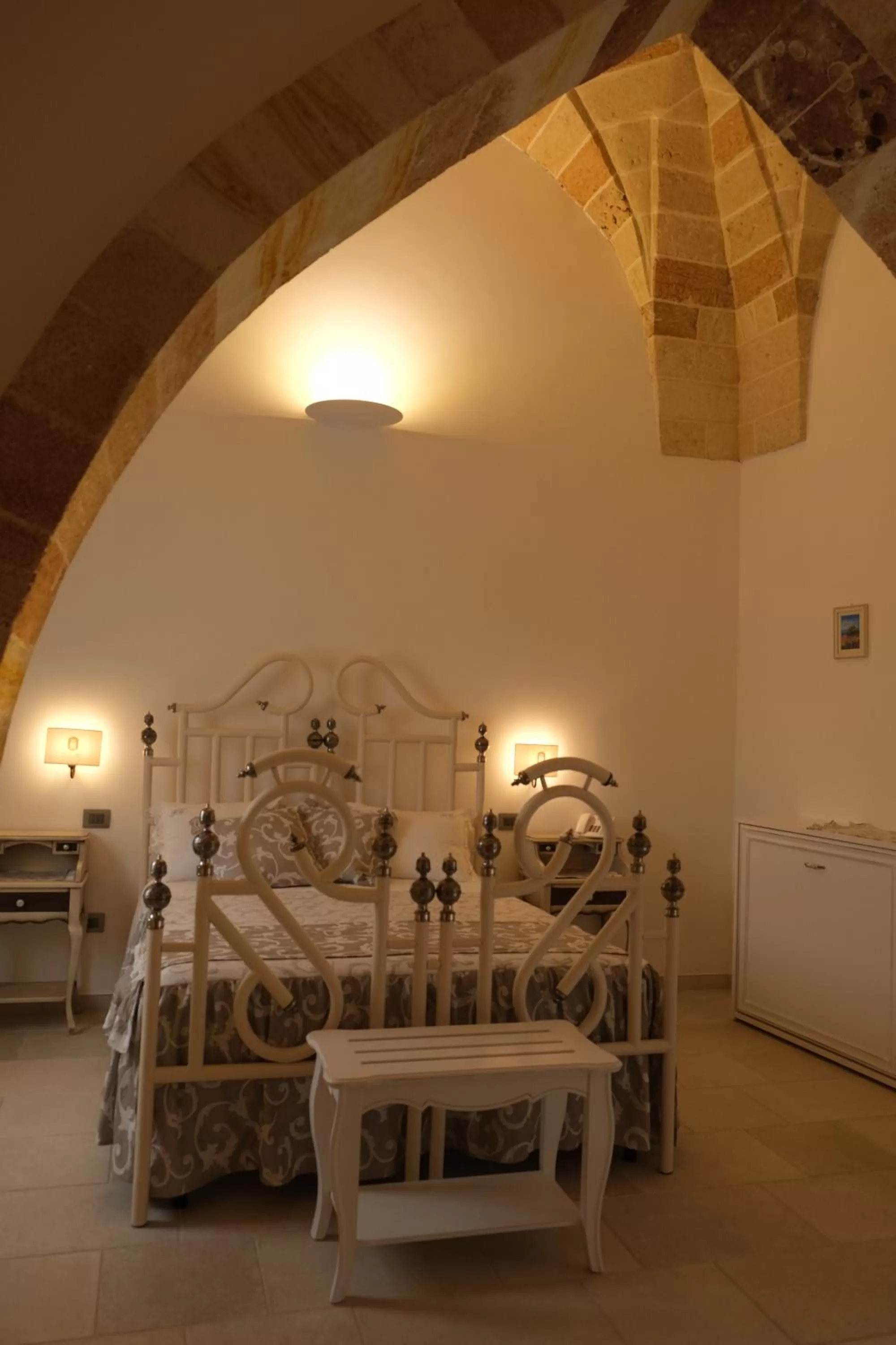 Bed in PLAZACARRISI HOTEL & SPA