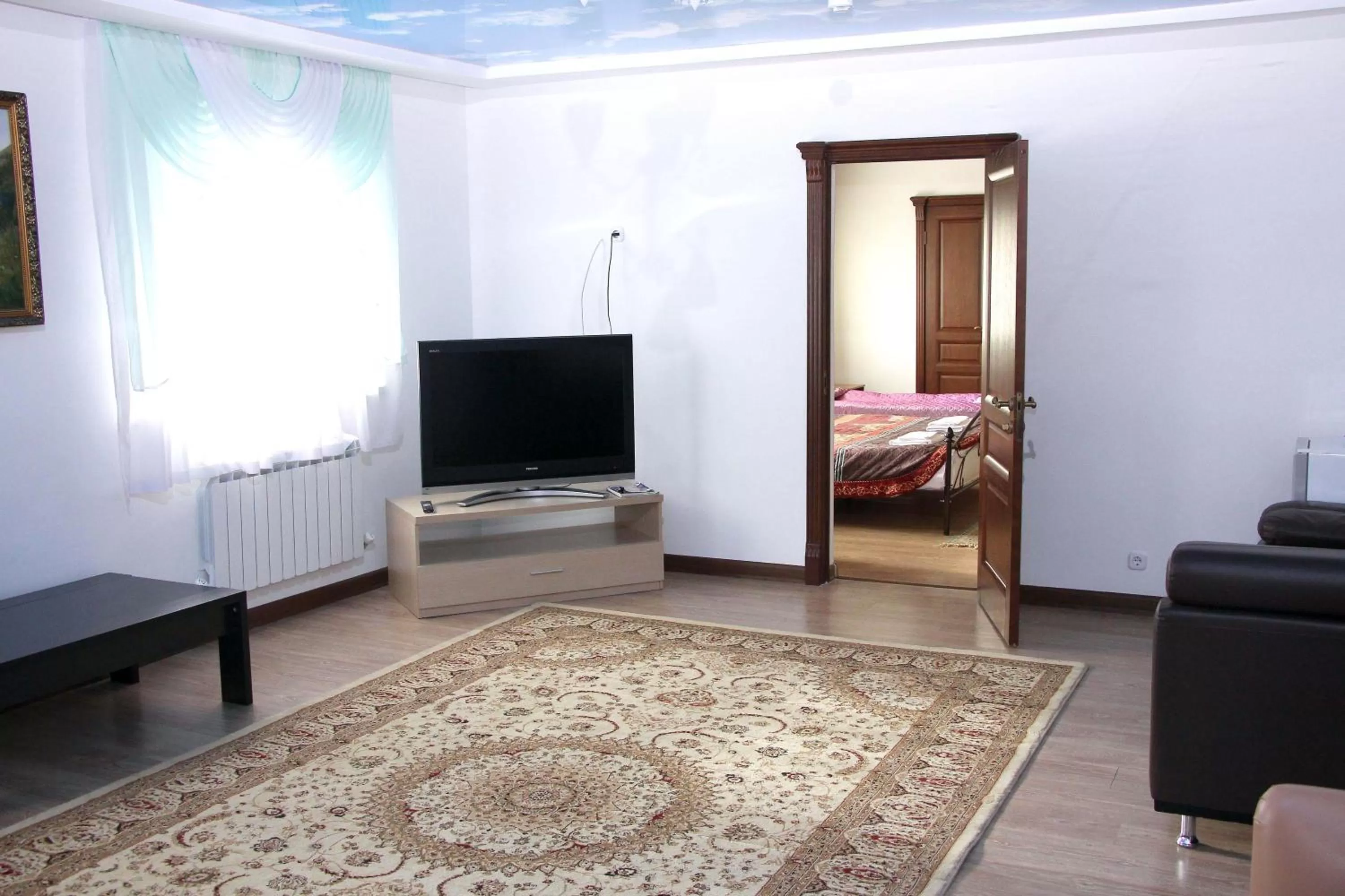 Seating area, Bed in Zhaylau Hotel