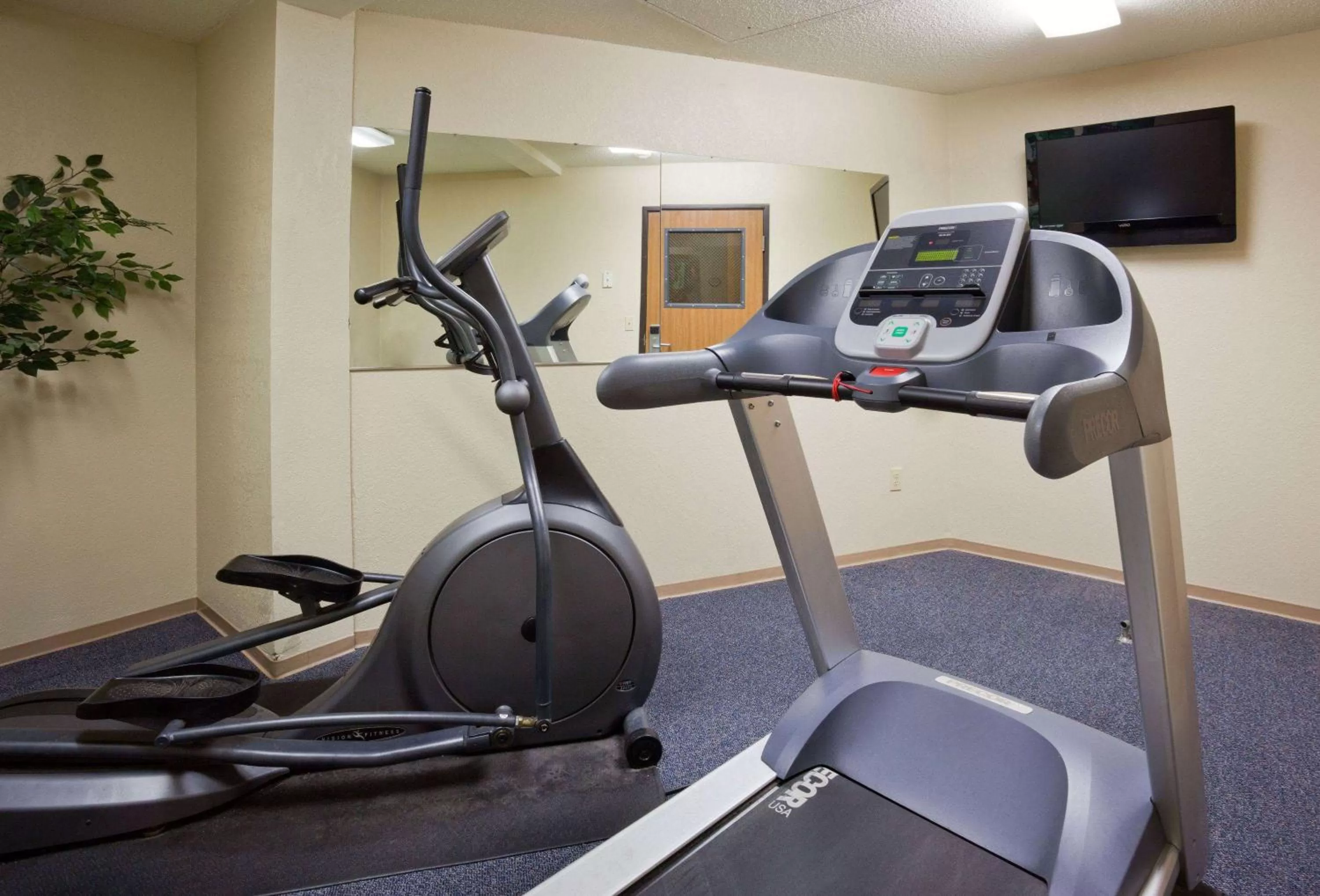 Fitness centre/facilities in AmericInn by Wyndham Fargo West Acres