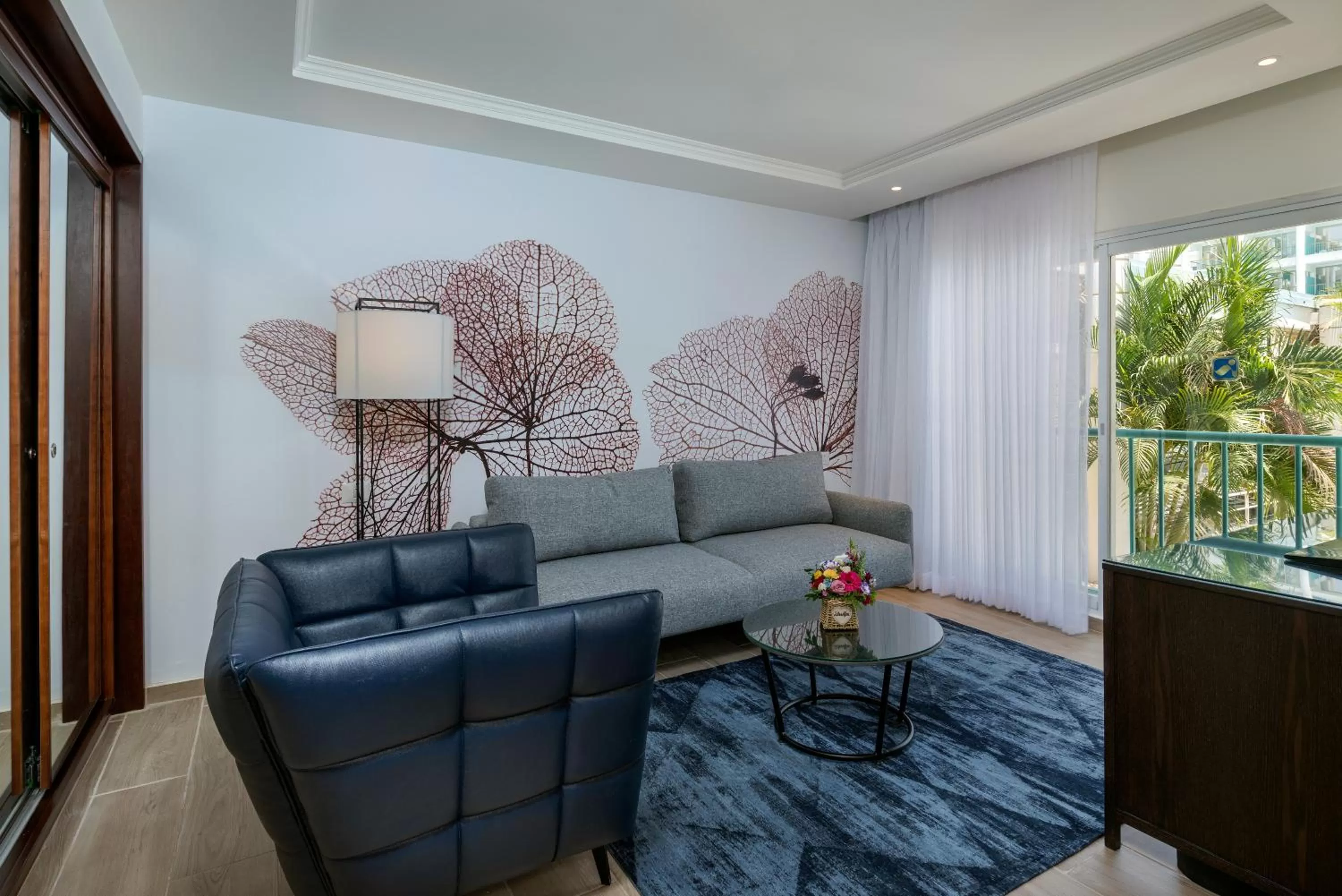 Seating area in Yam Suf by Isrotel Collection