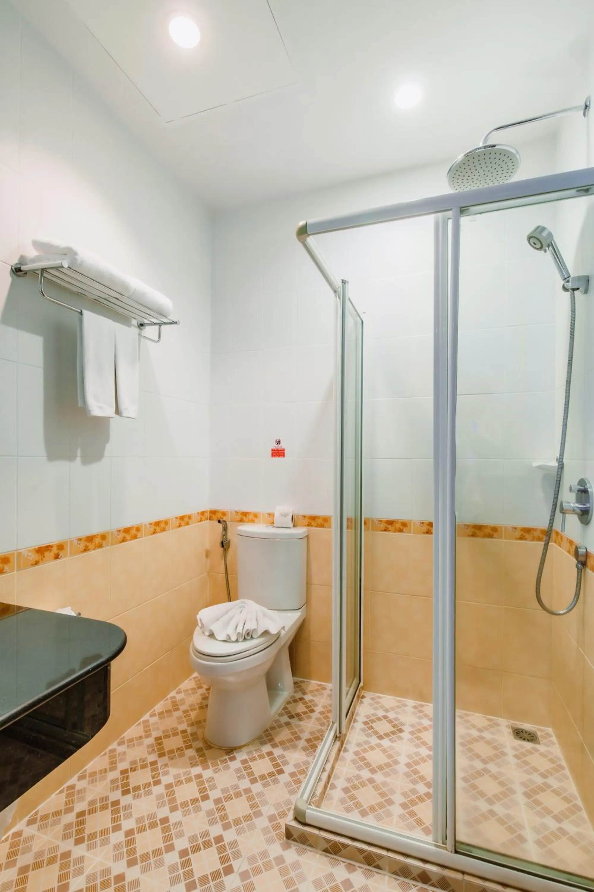 Shower in Elite Suites Patong