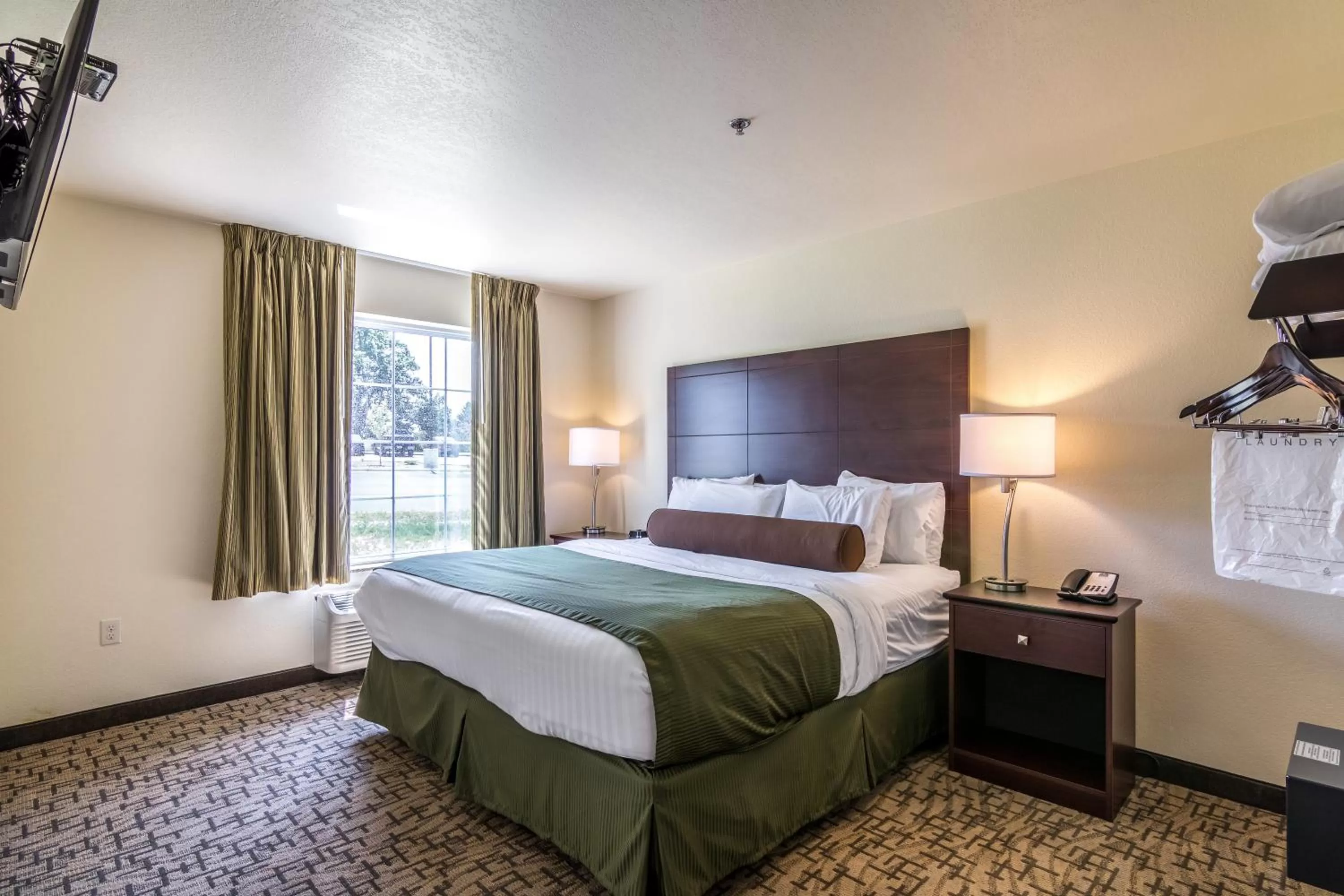 Bed in Cobblestone Inn & Suites - Barron