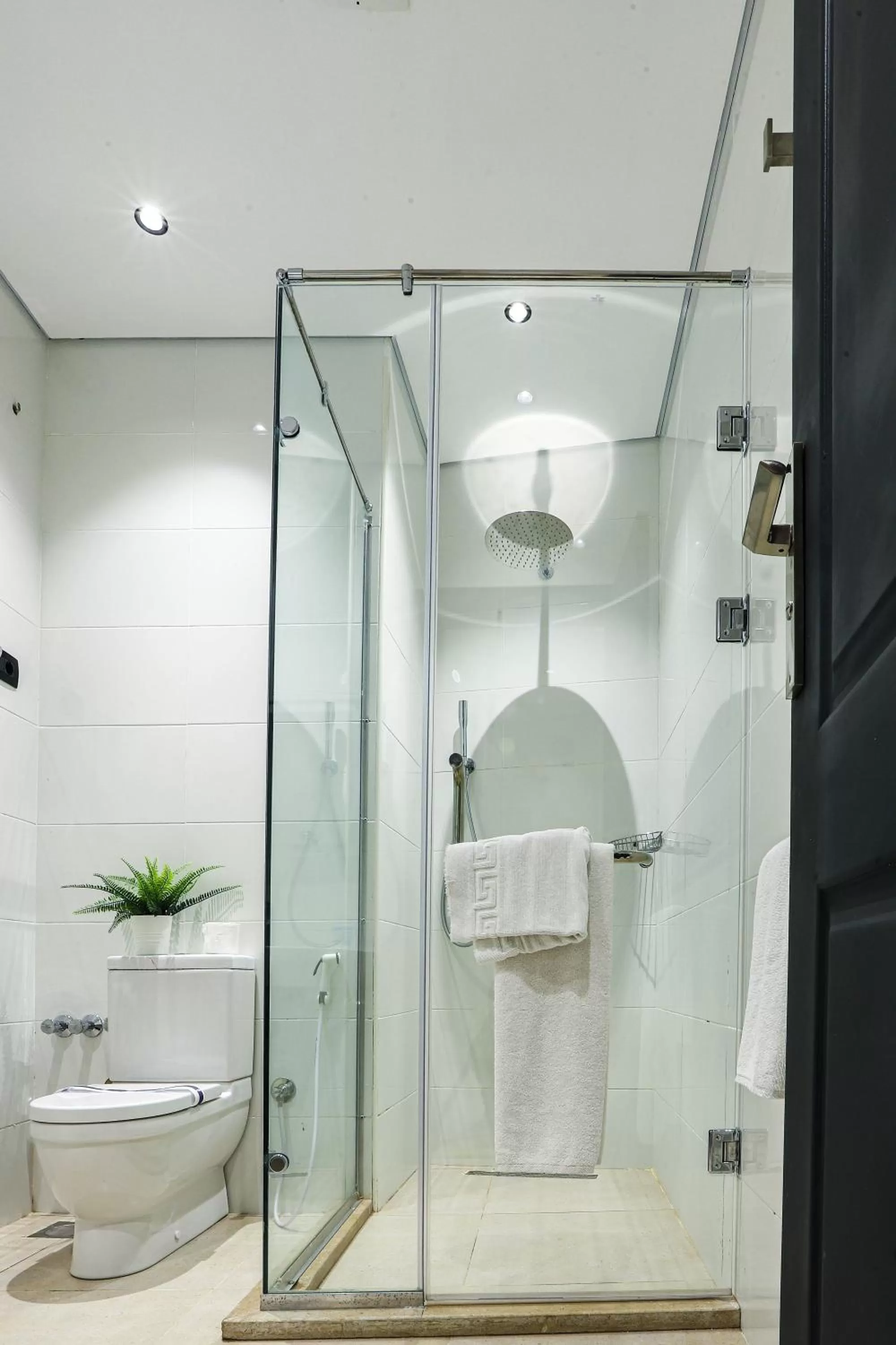 Bathroom in NewCity Hotel & Suites