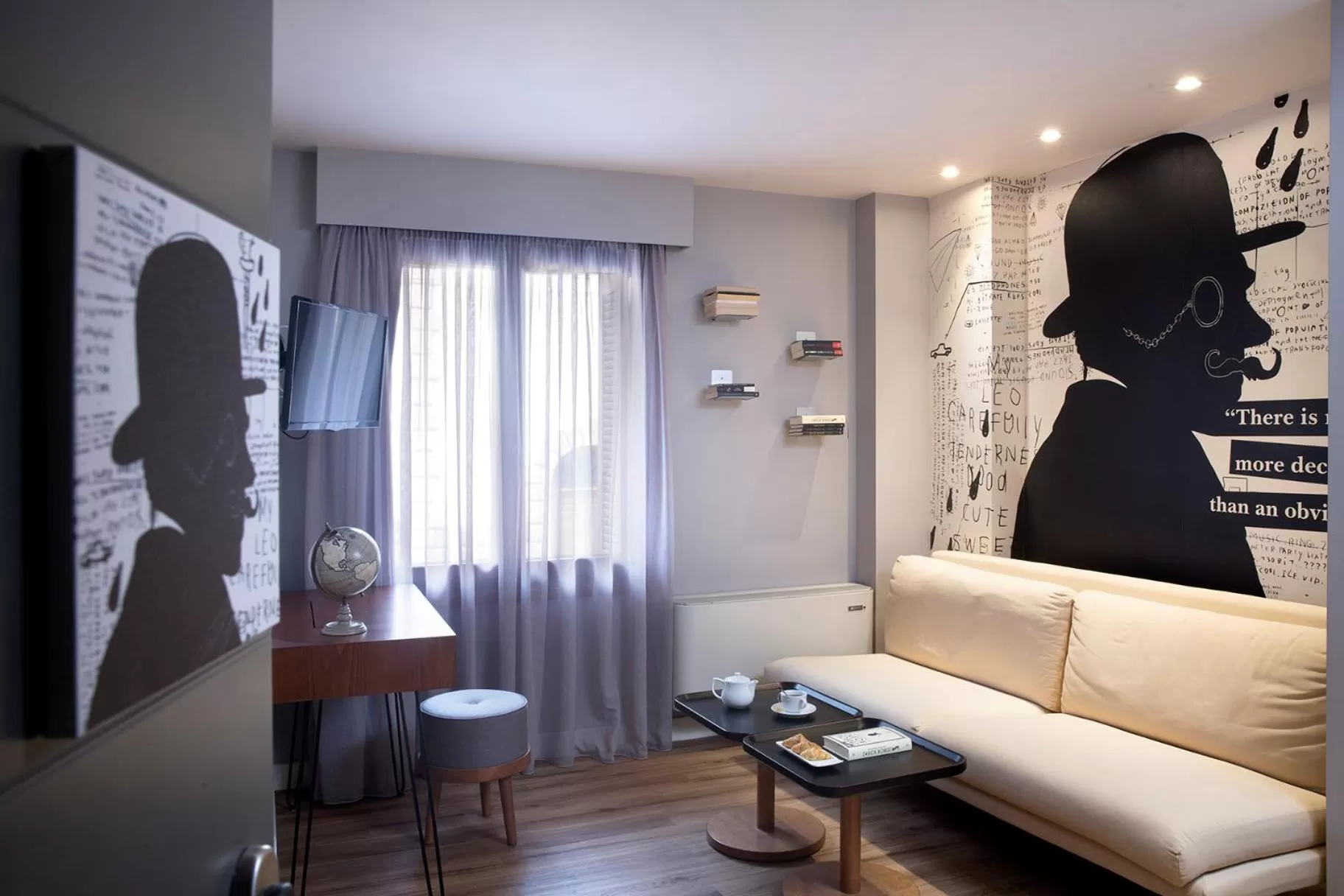 Seating area in Apollon Library Suites