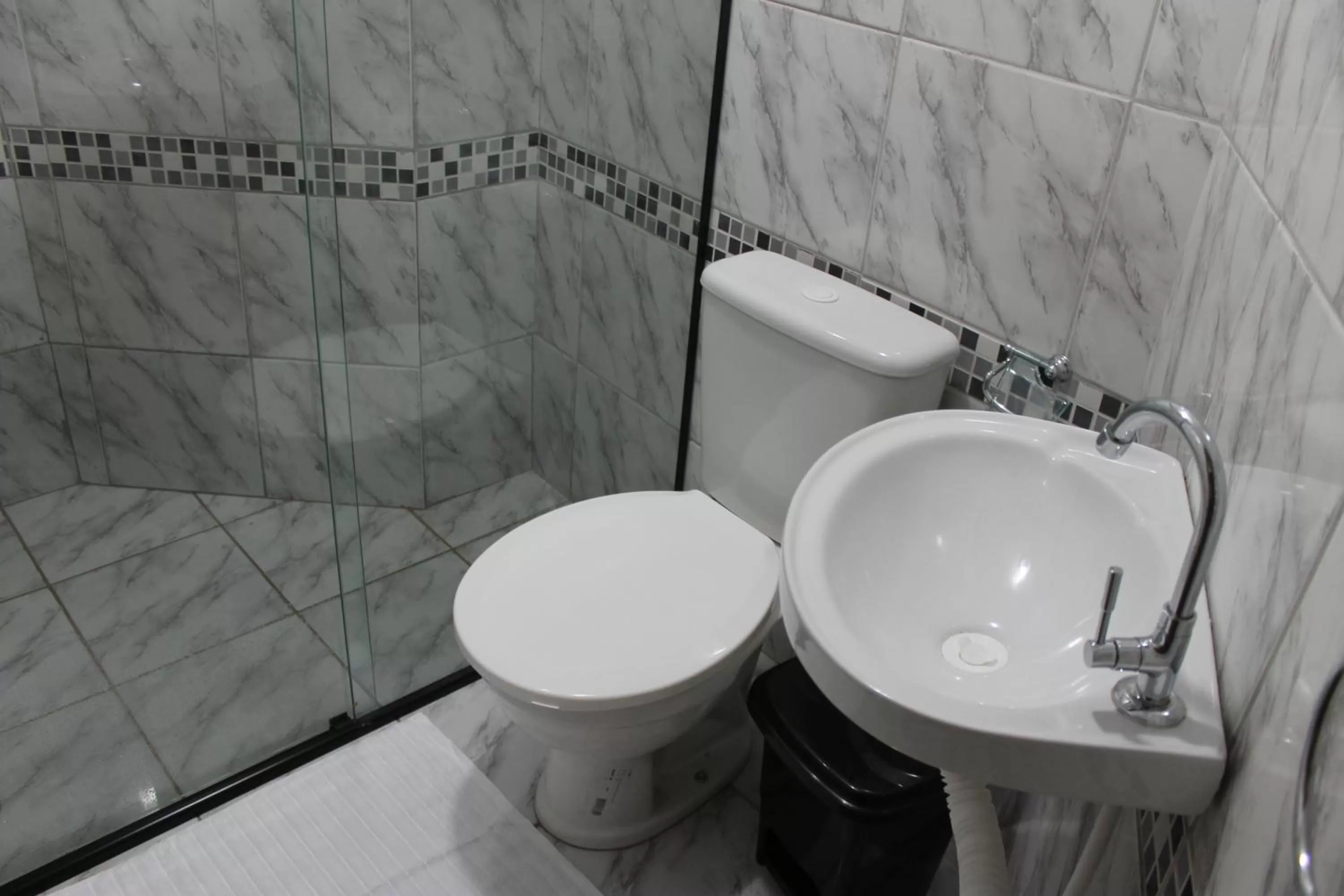 Bathroom in Pousada Das Palmeiras