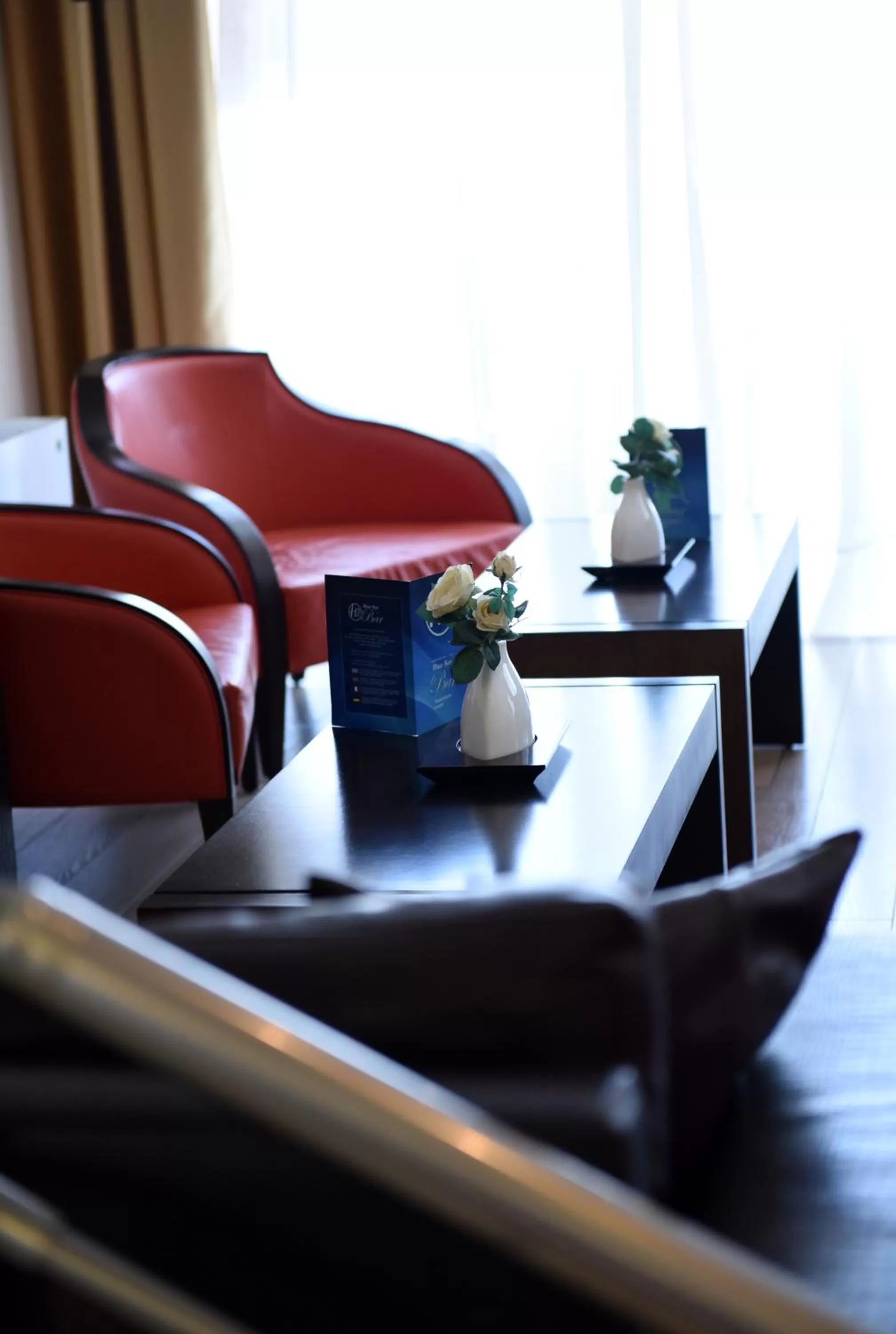 Communal lounge/ TV room in Blue Sea Hotel