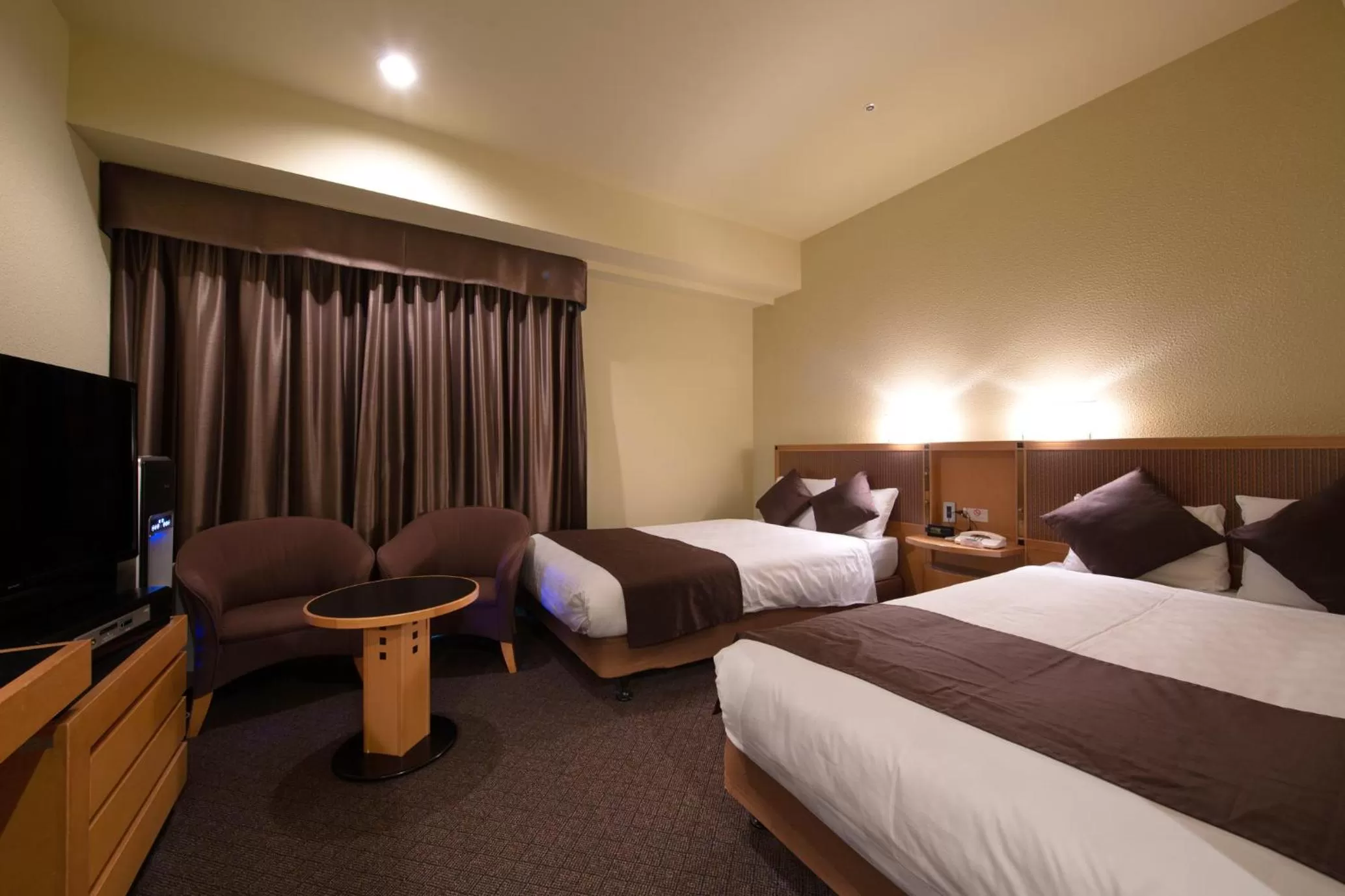 Bed in Hotel Nagoya Garden Palace