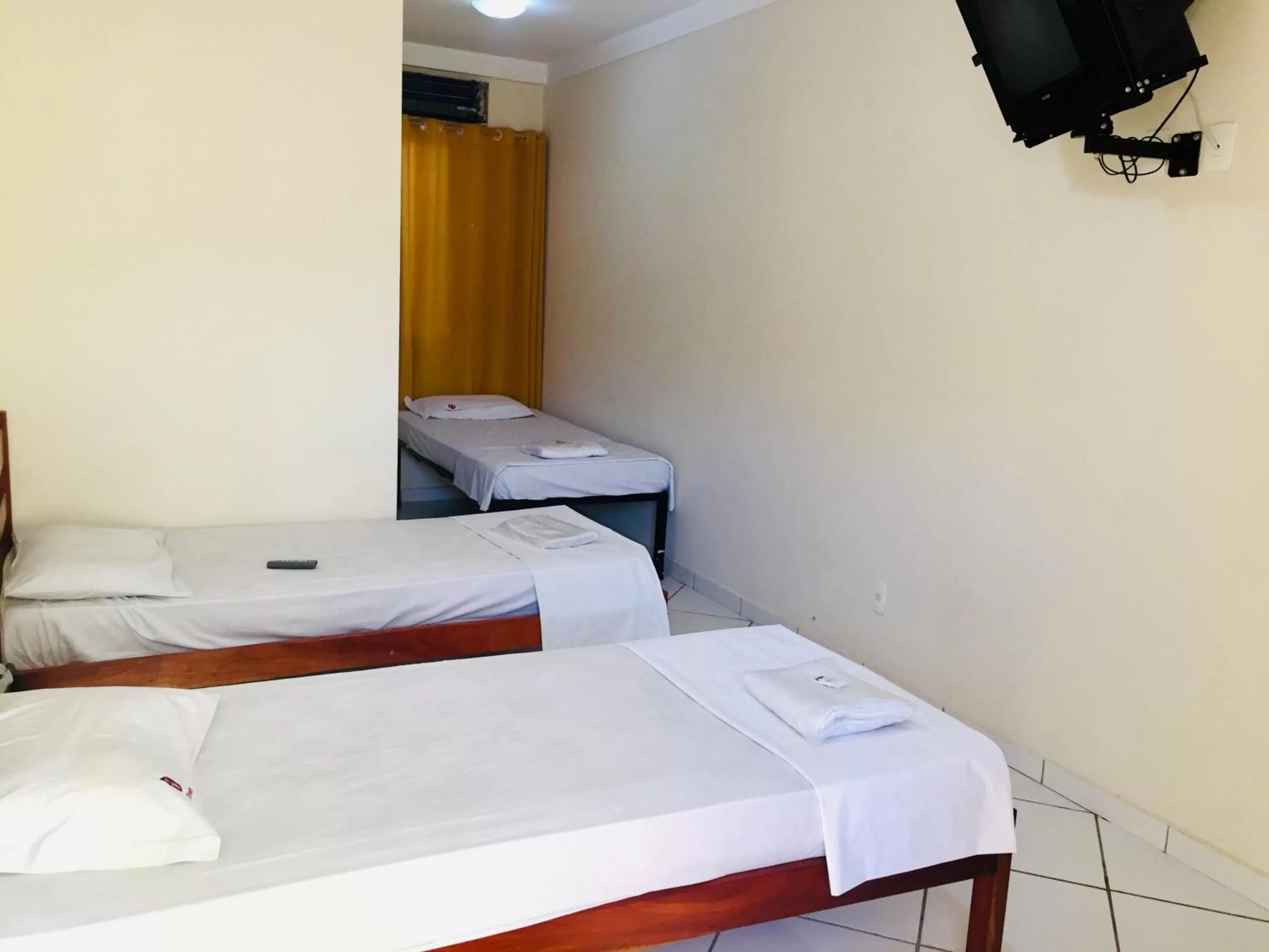 Bed in Hotel Oliveira