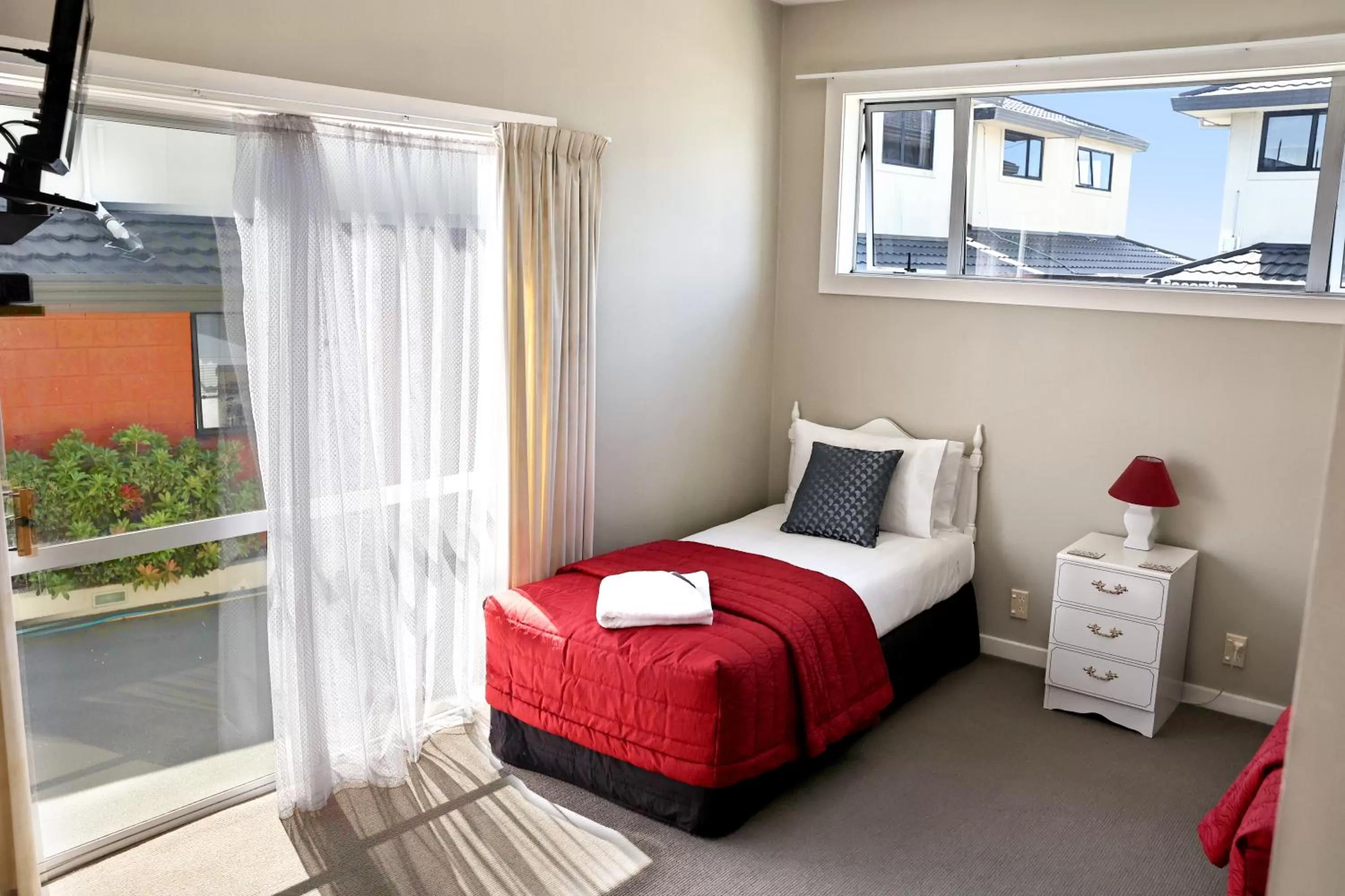 Bed in Baywatch Motor Lodge