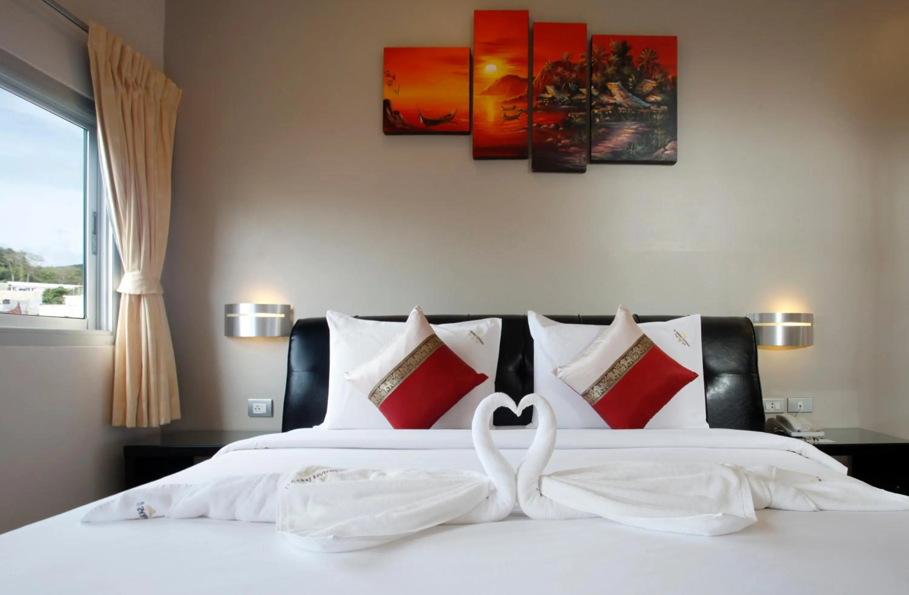 Bed in U Sabai Living Hotel