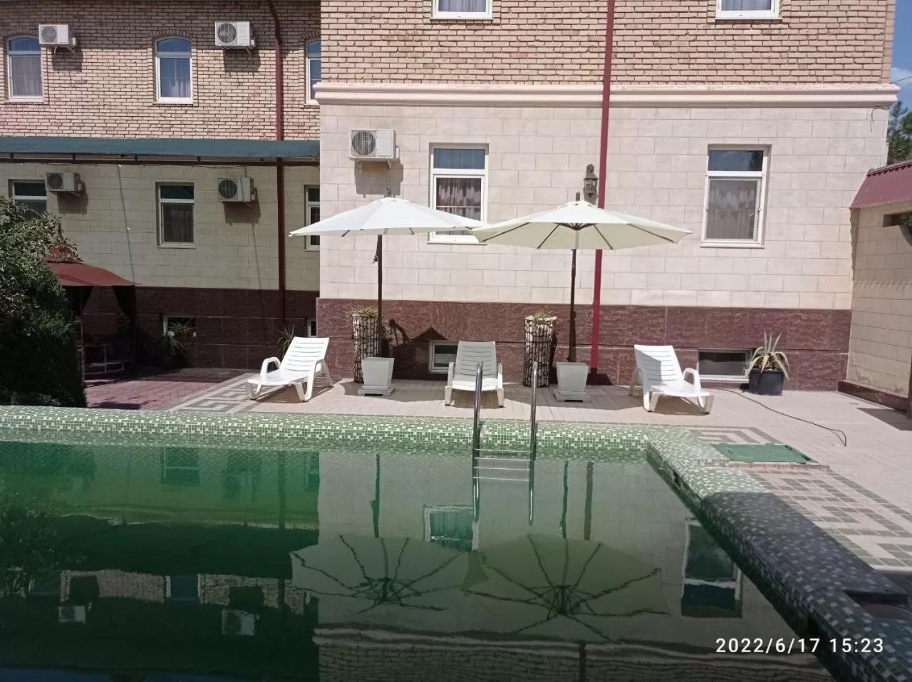 Garden, Swimming Pool in Maximum Hotel