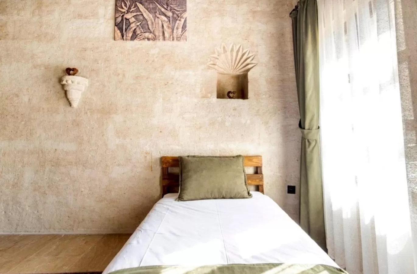 Bed in Uzay Cave Suite Hotel