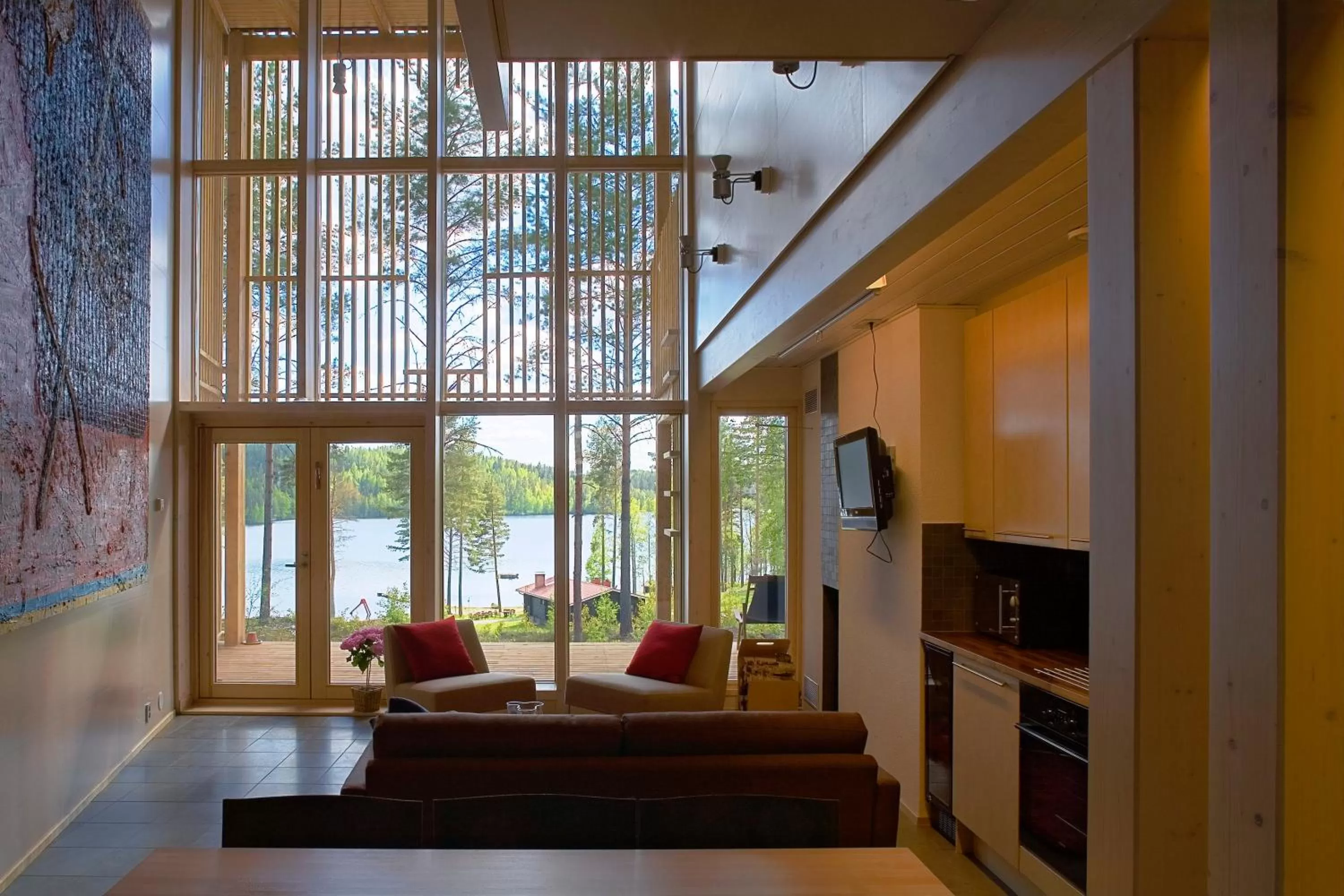 Living room, Seating Area in Saimaanranta Resort by Anttolanhovi