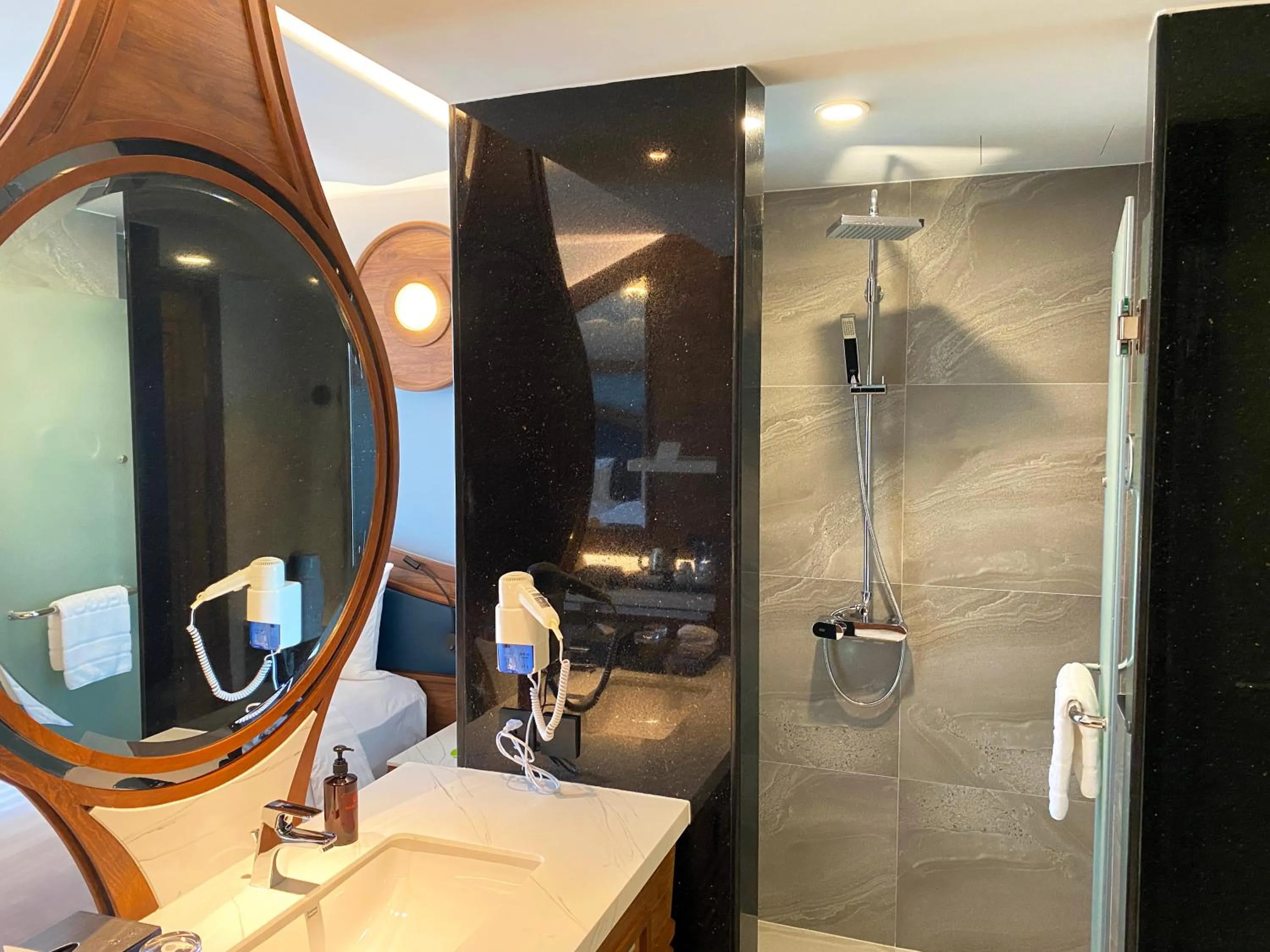 Bathroom in The Oceanic Sportel Phuket - SHA Extra Plus