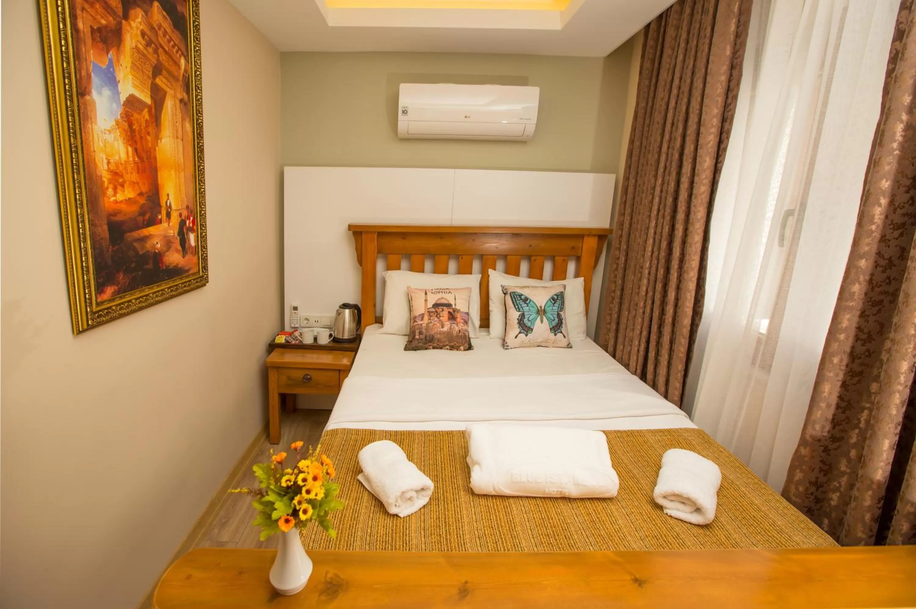 Bed in The PeraPort Hotel