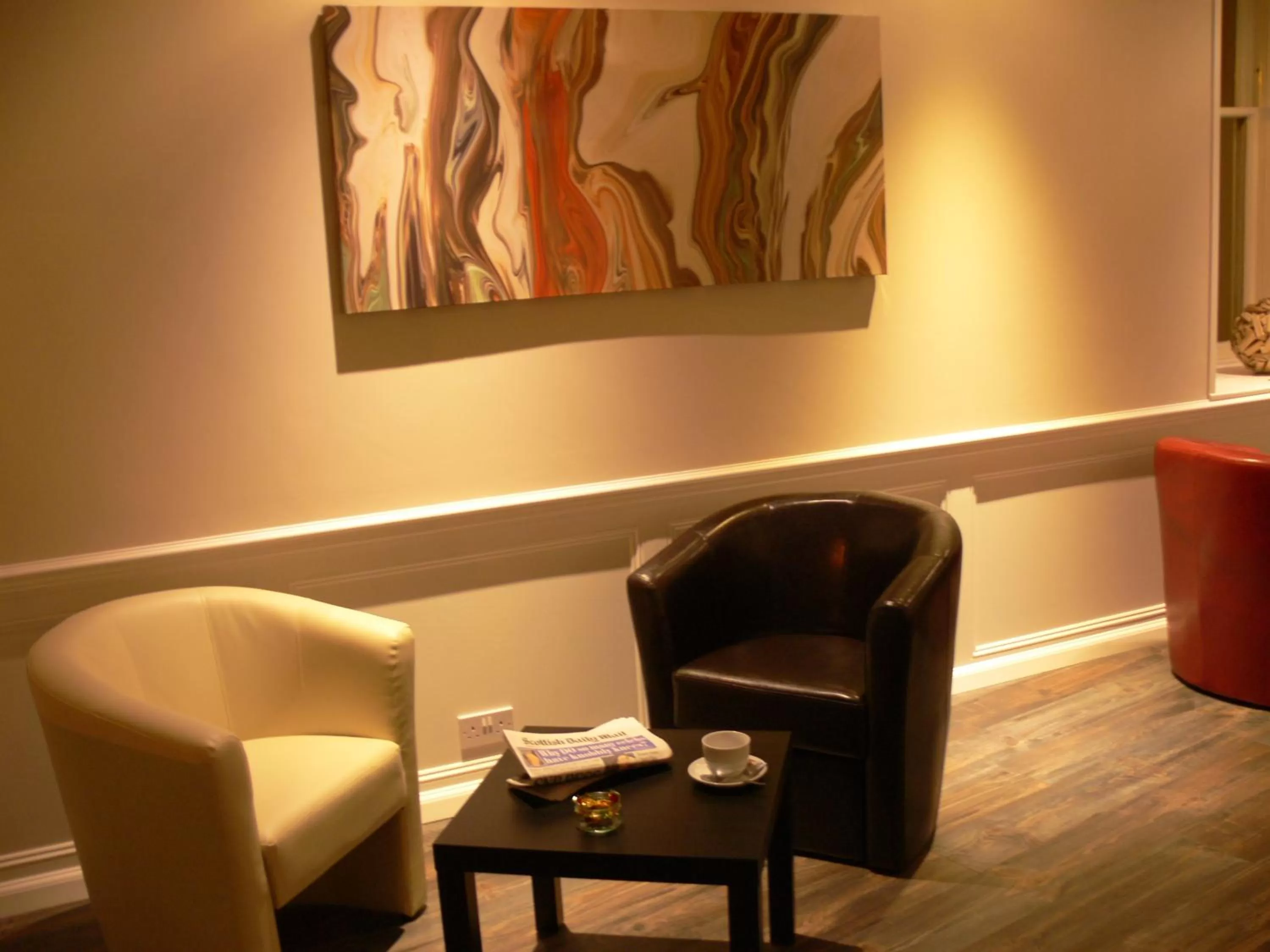 Living room in The Home Arms Guesthouse