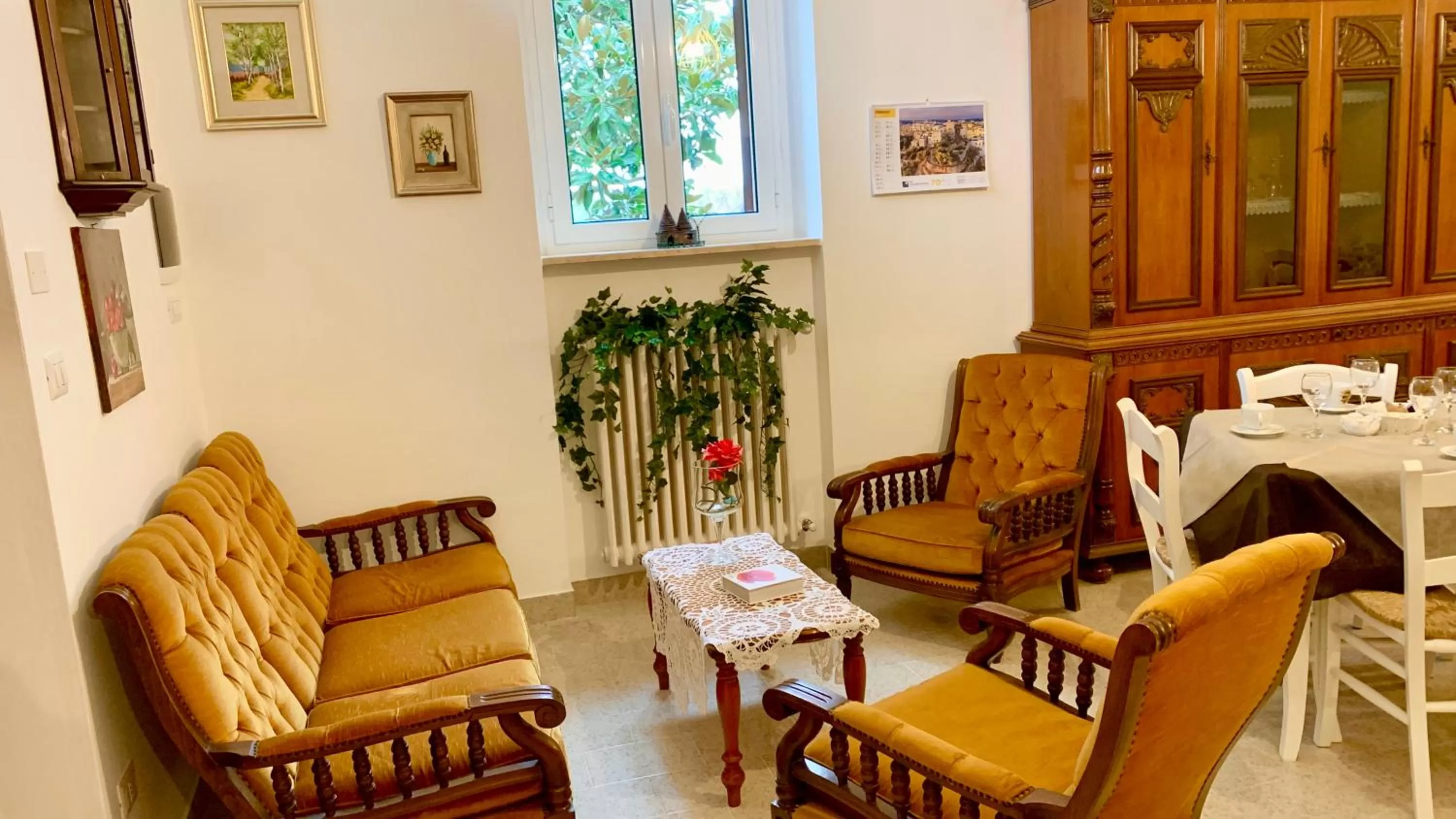 Communal lounge/ TV room in B&B Villa Maggi