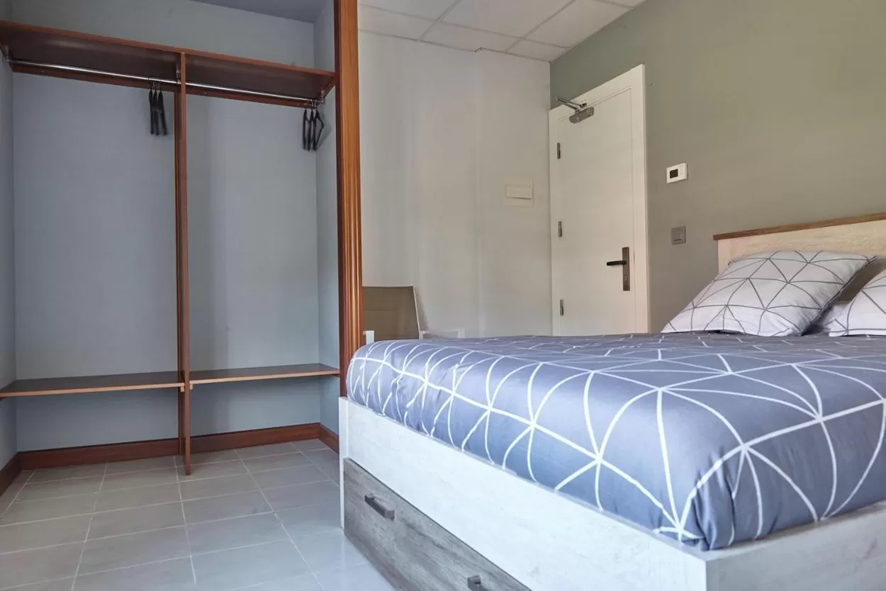 Bed in HOSTAL FONTAÑAN