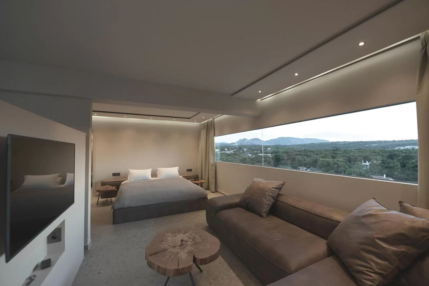 Living room, Bed in King Saron Hotel Resort