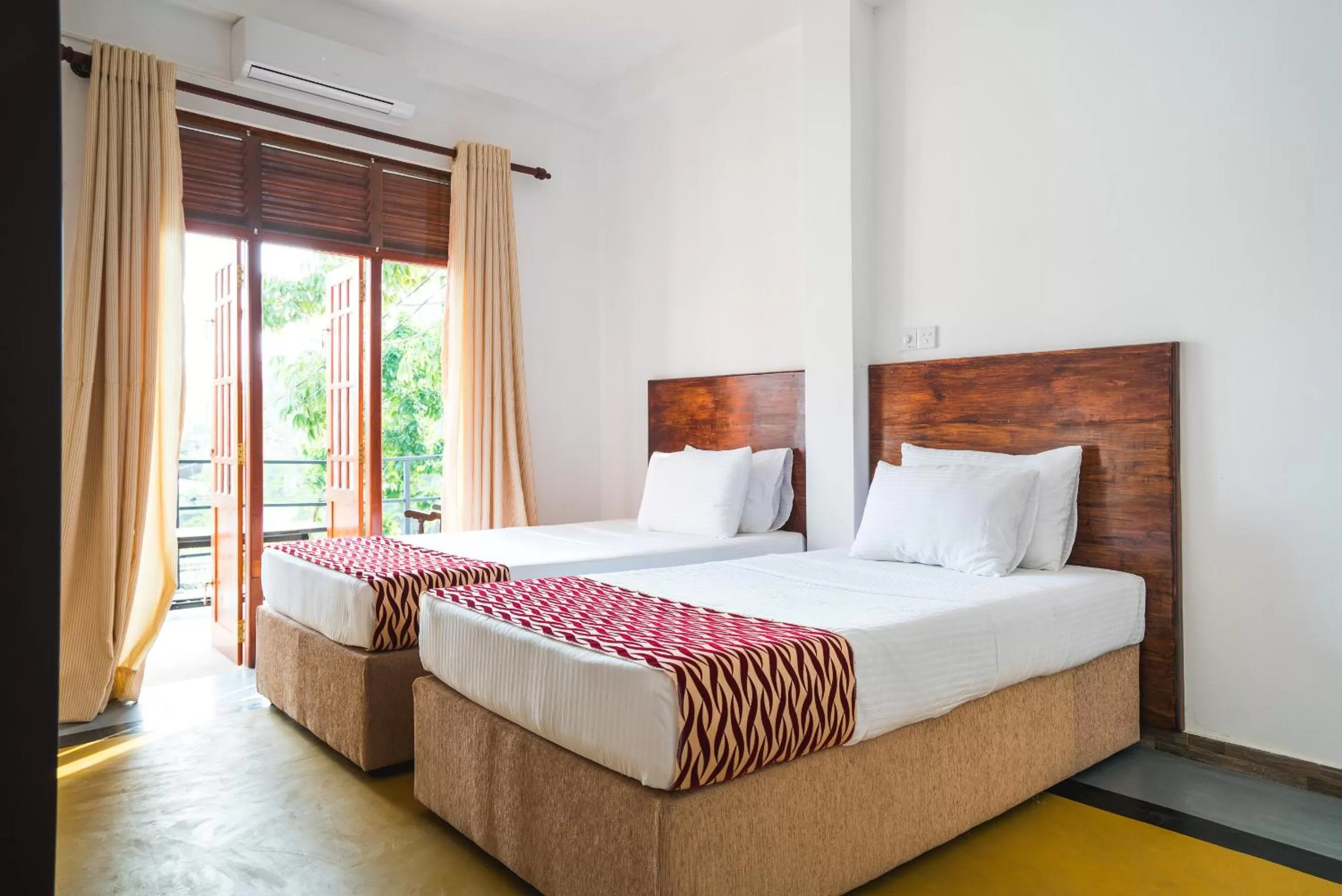 Bed in Ocean Bay Surf Resort Weligama