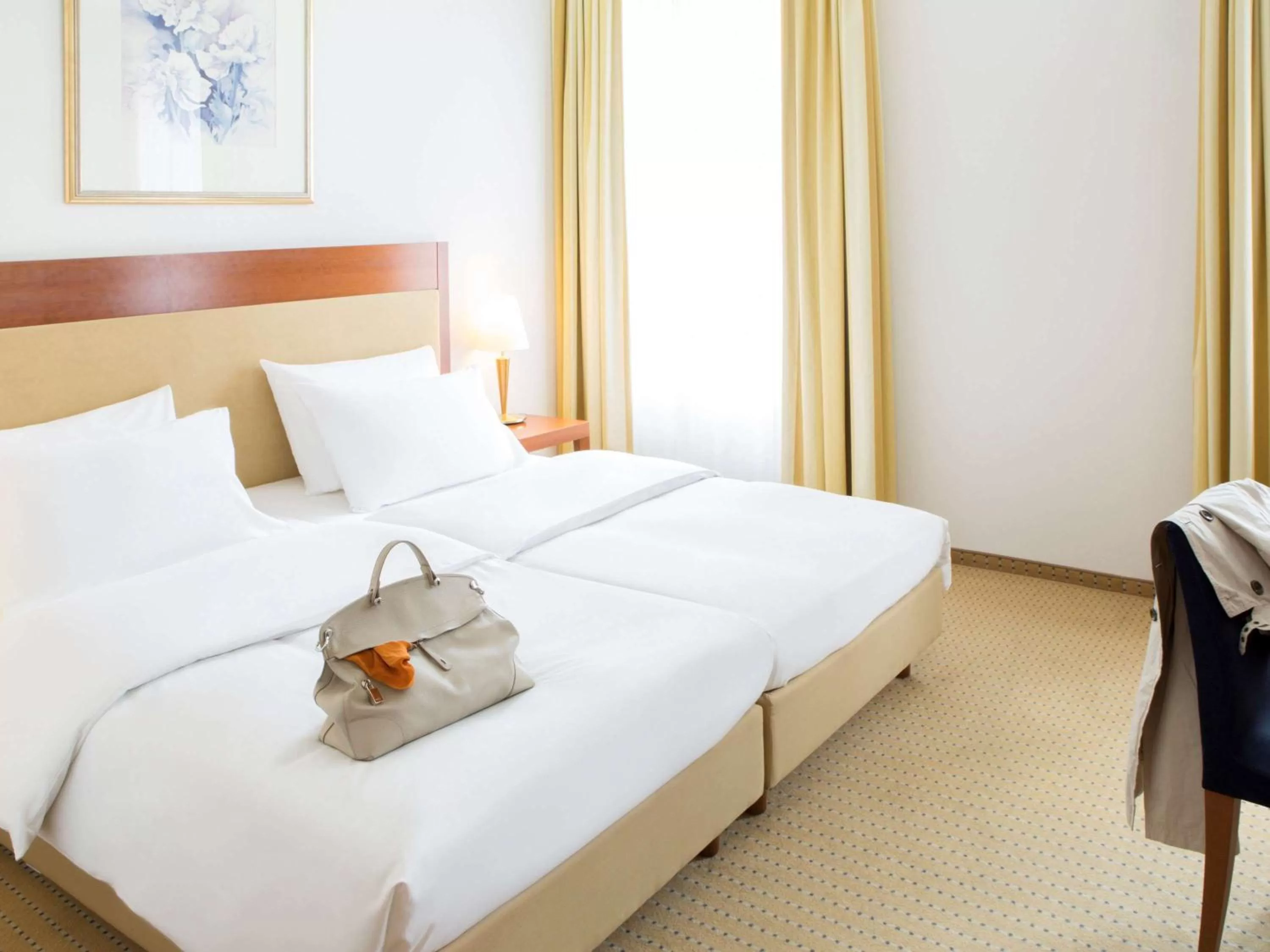 Photo of the whole room, Bed in NOVOTEL Hildesheim City