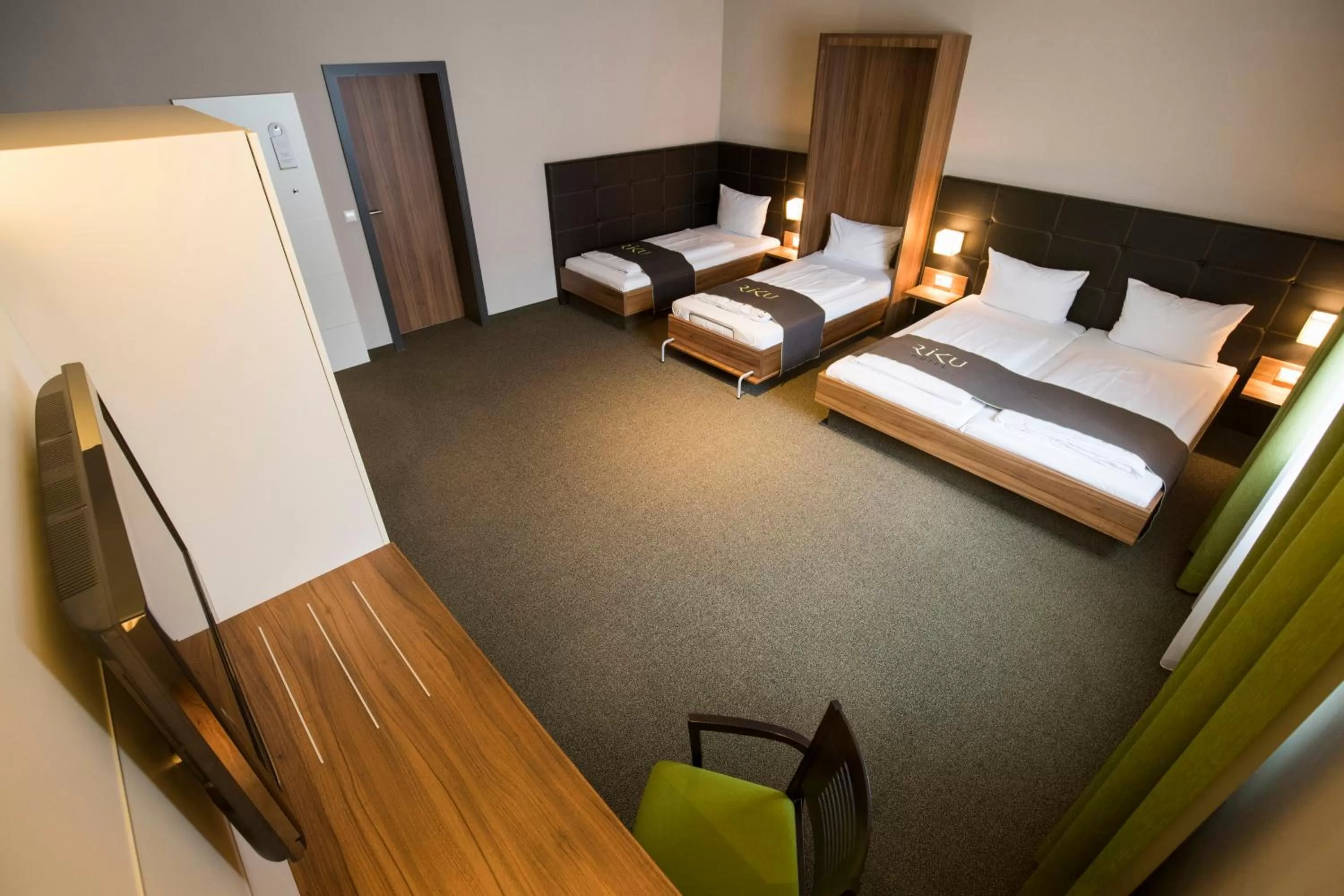 Photo of the whole room, Bed in RiKu HOTEL Neu-Ulm