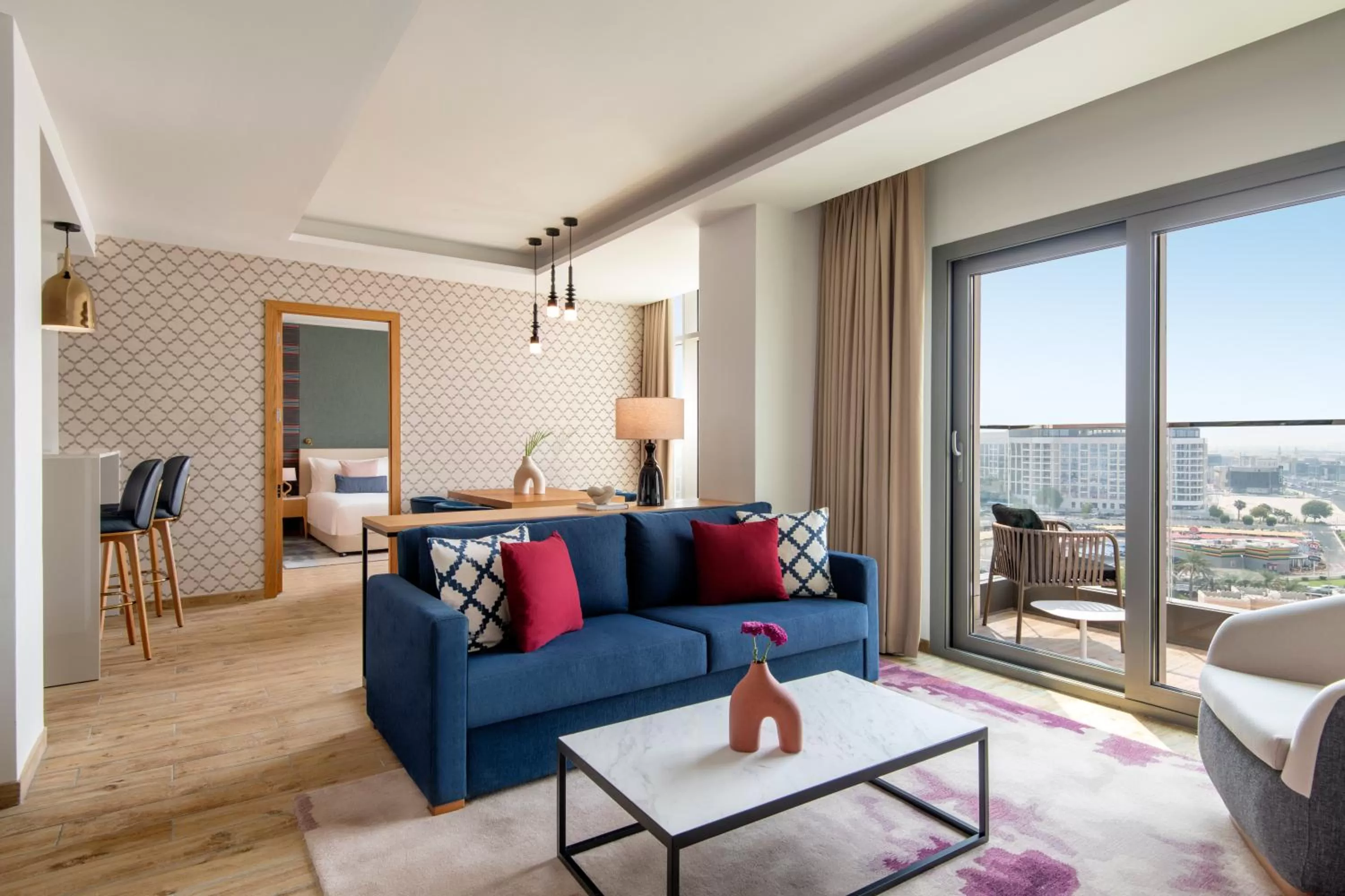 Living room in Abesq Doha Hotel and Residences, an IHG Hotel