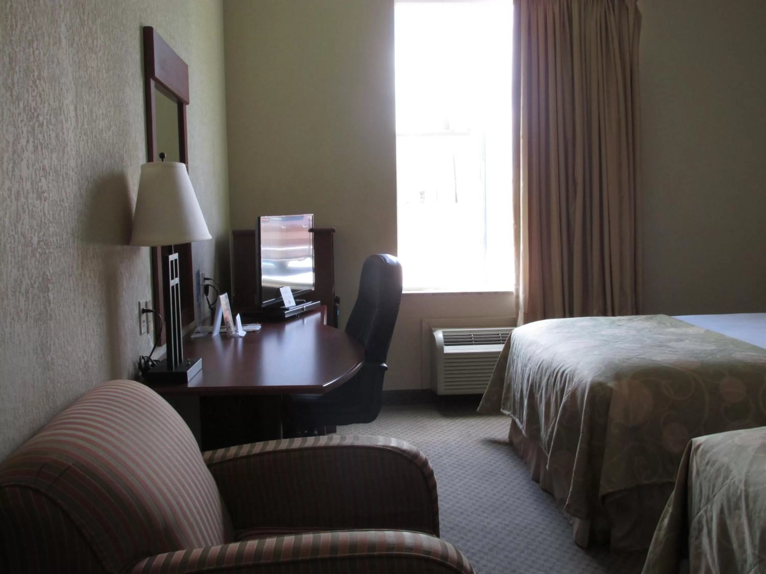 Seating area, TV/Entertainment Center in Baymont by Wyndham Marrero