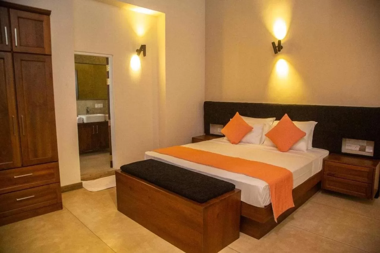 Bed in WindMill Beach Villa and Hotel