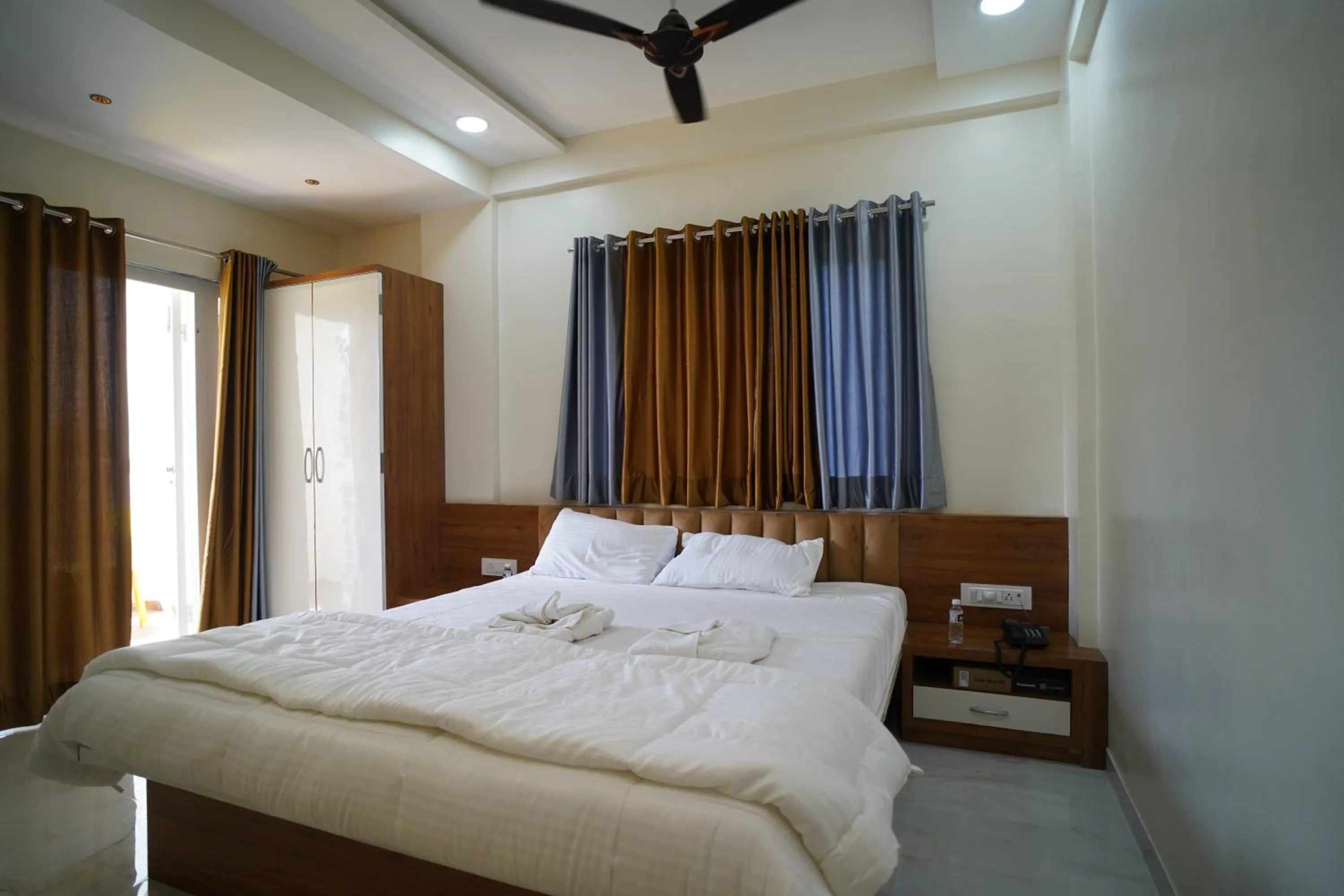 Photo of the whole room, Bed in Hotel Madhavan International