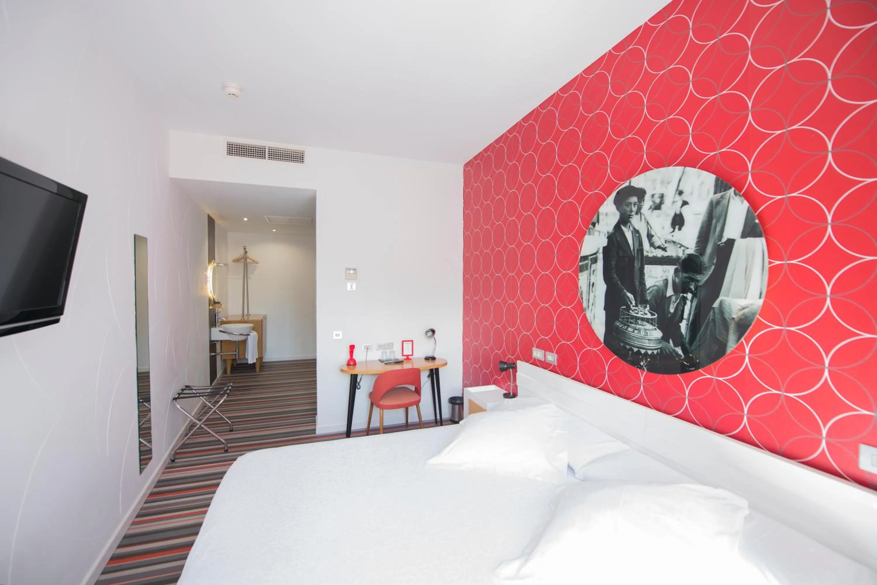 Bed in Posada del Dragón Boutique Hotel