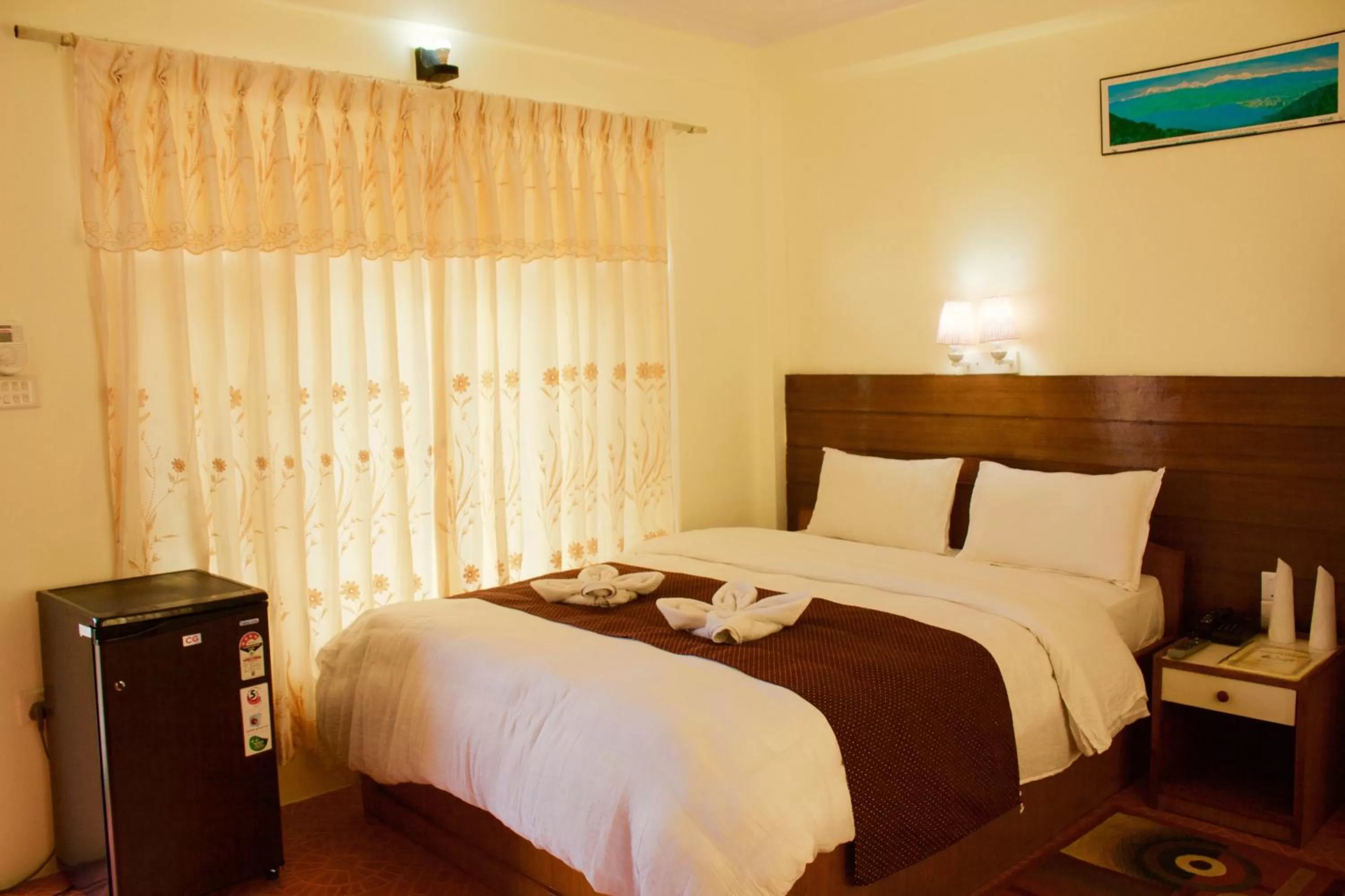 Bed in Hotel Himalayan Inn