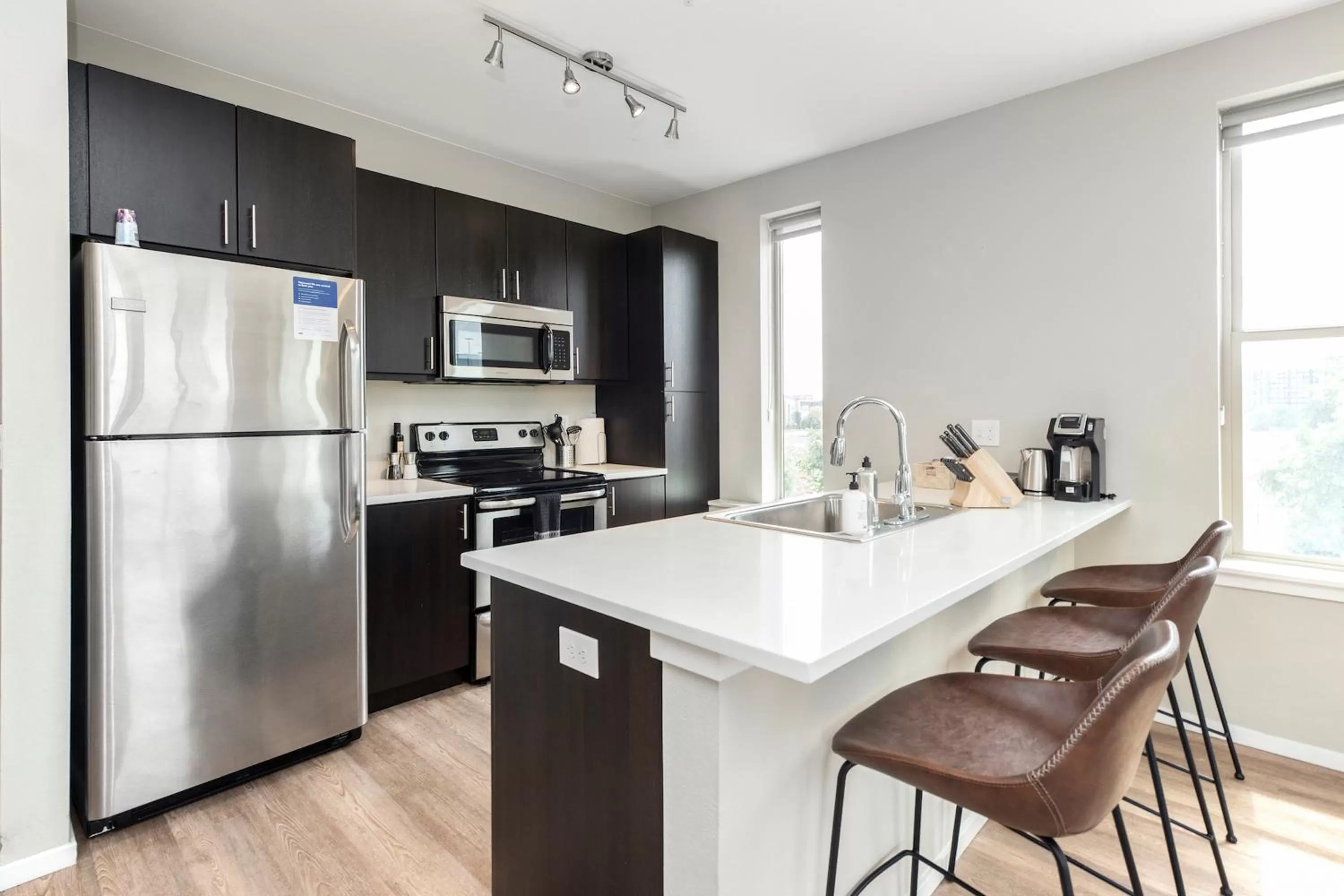 Kitchen or kitchenette, Kitchen/Kitchenette in Kasa Comma LoHi Denver