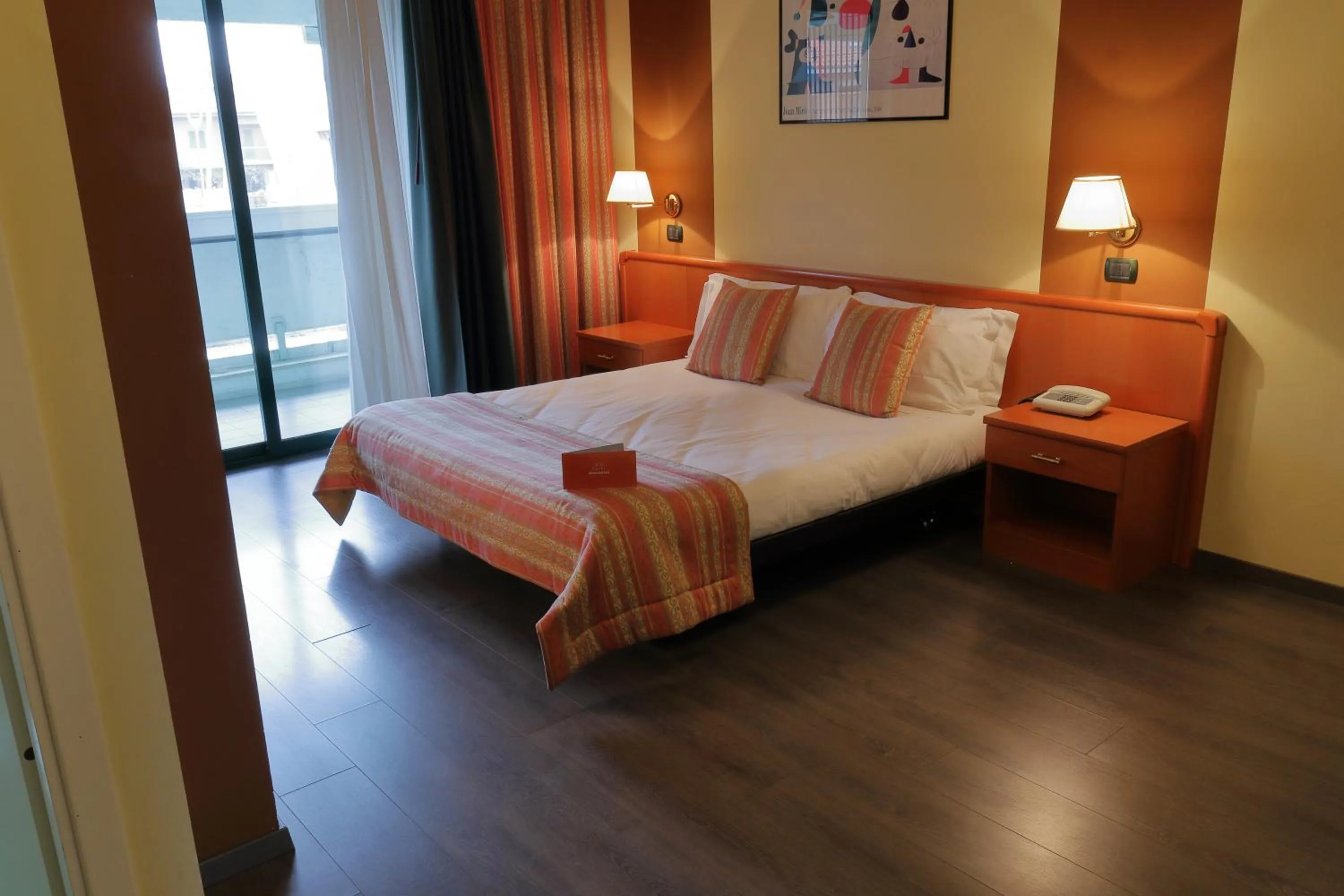 Bed in Hotel Romanisio