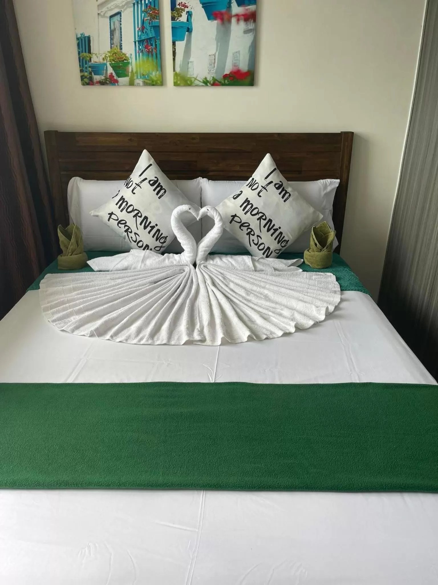 Bed in Green Residences Stays by PBYY