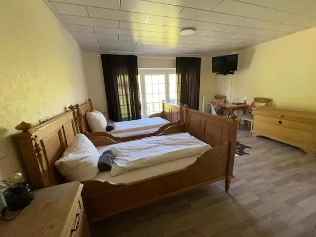 Bed in Hotel Rehkitz