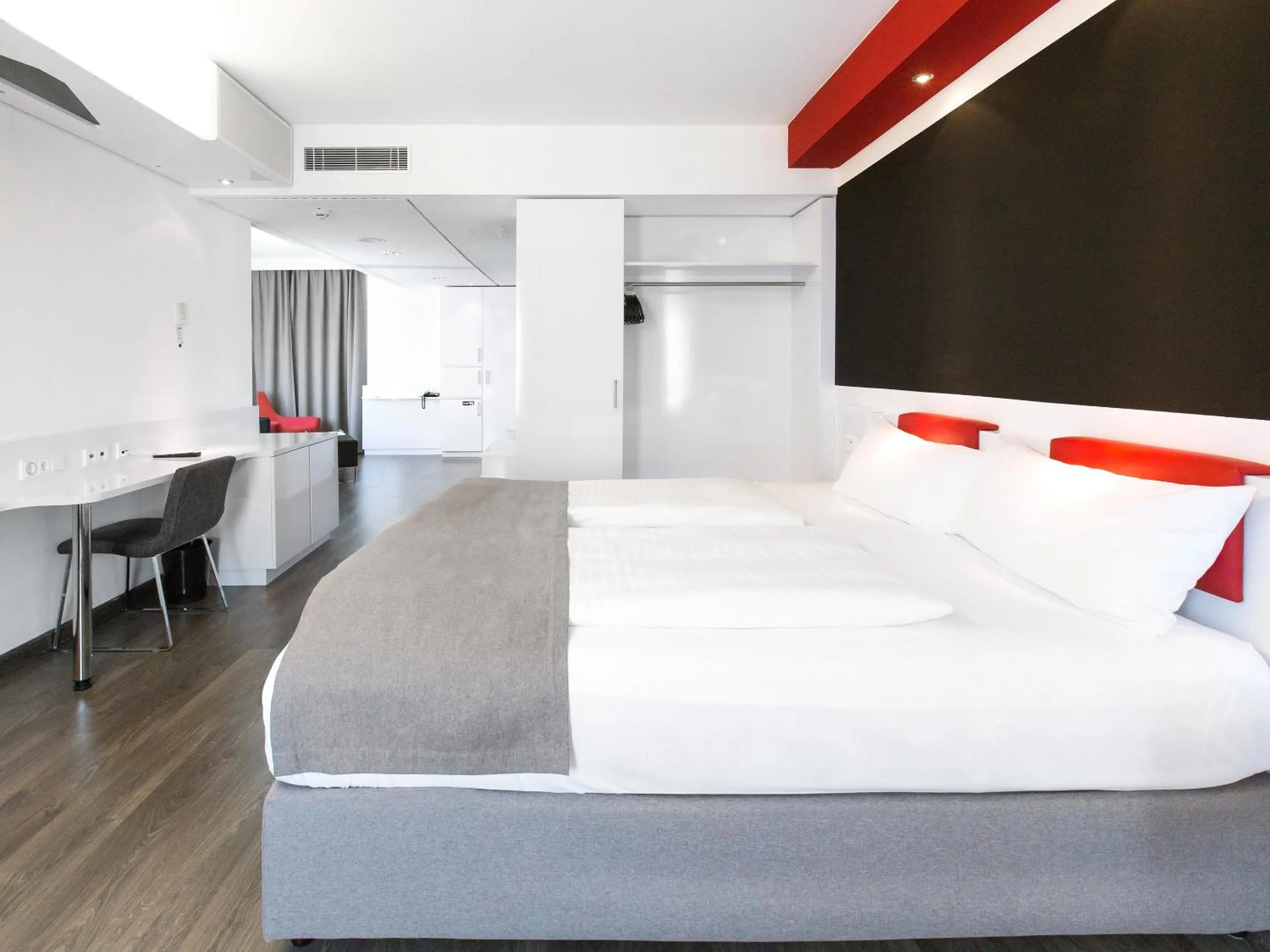 Photo of the whole room, Bed in DORMERO Hotel Stuttgart