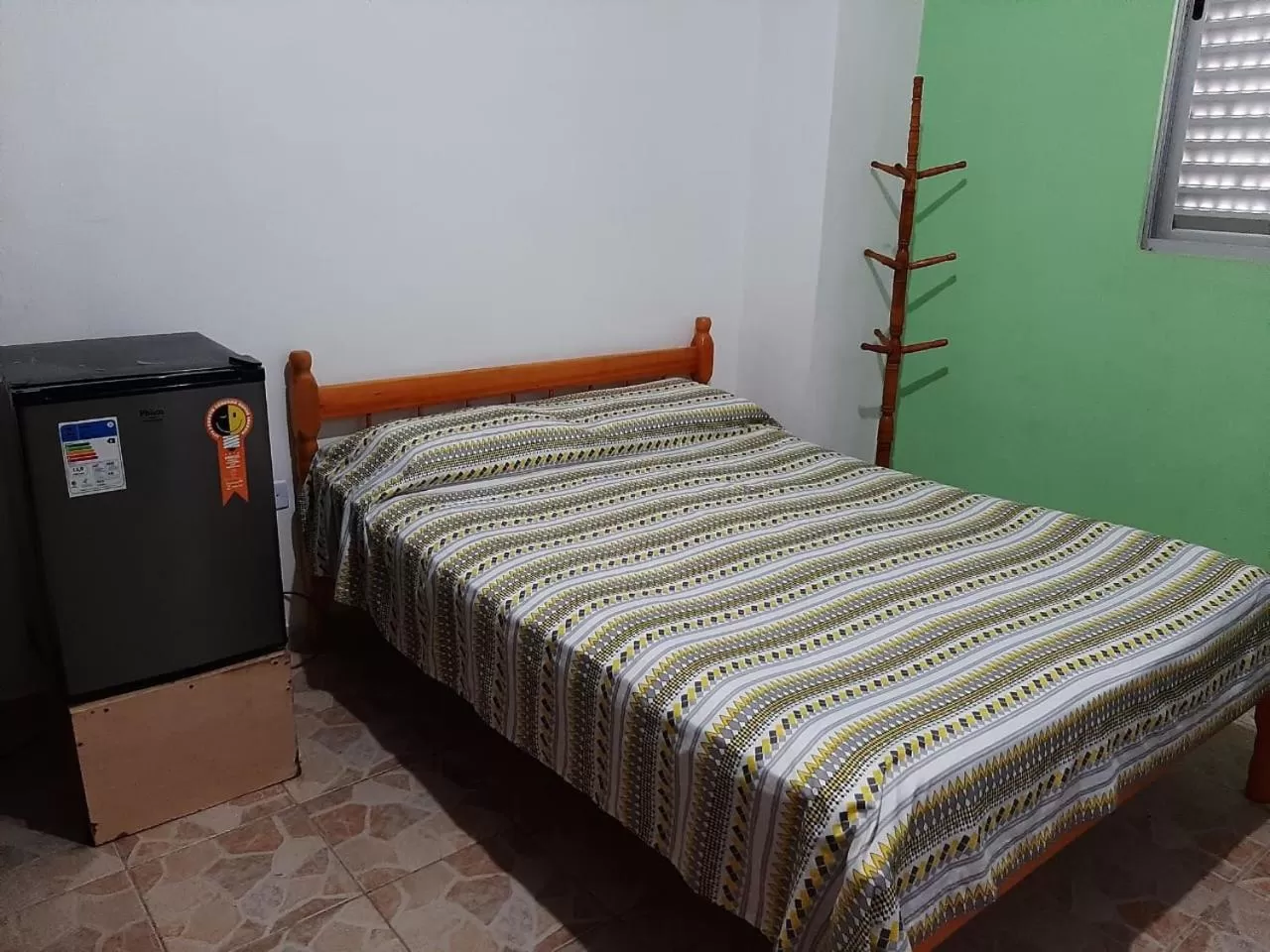 Bed in Pousada Canoas