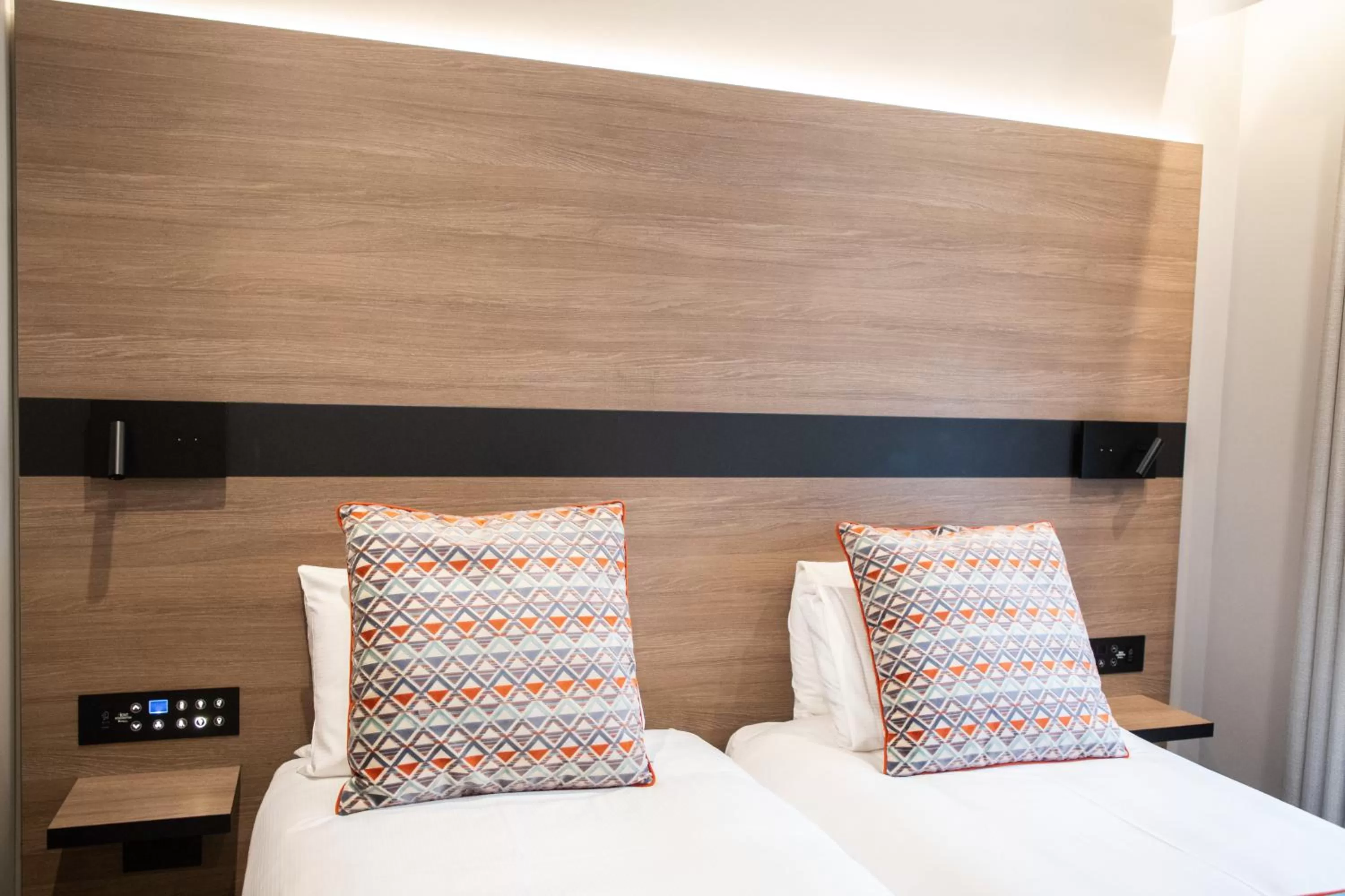 Bed in Merit Kensington Hotel