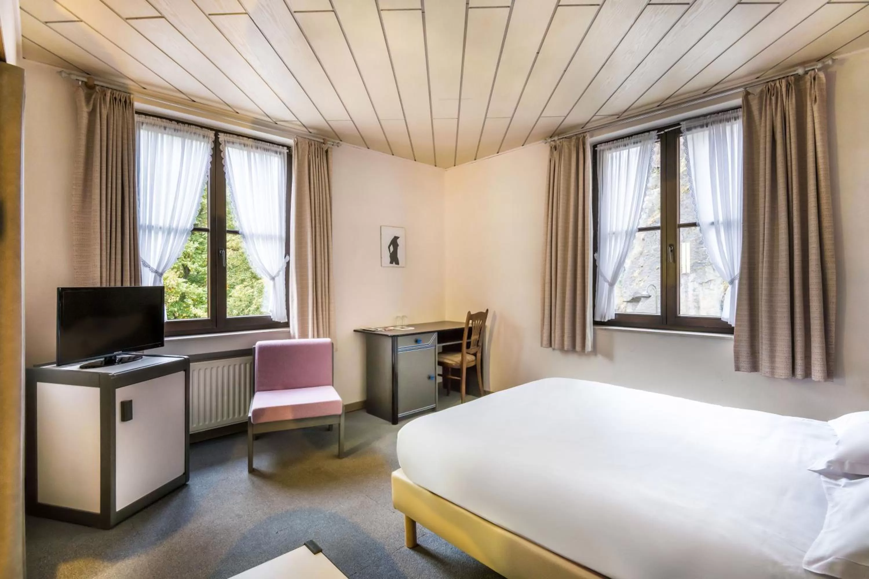 Bed in Hotel Le Postillon