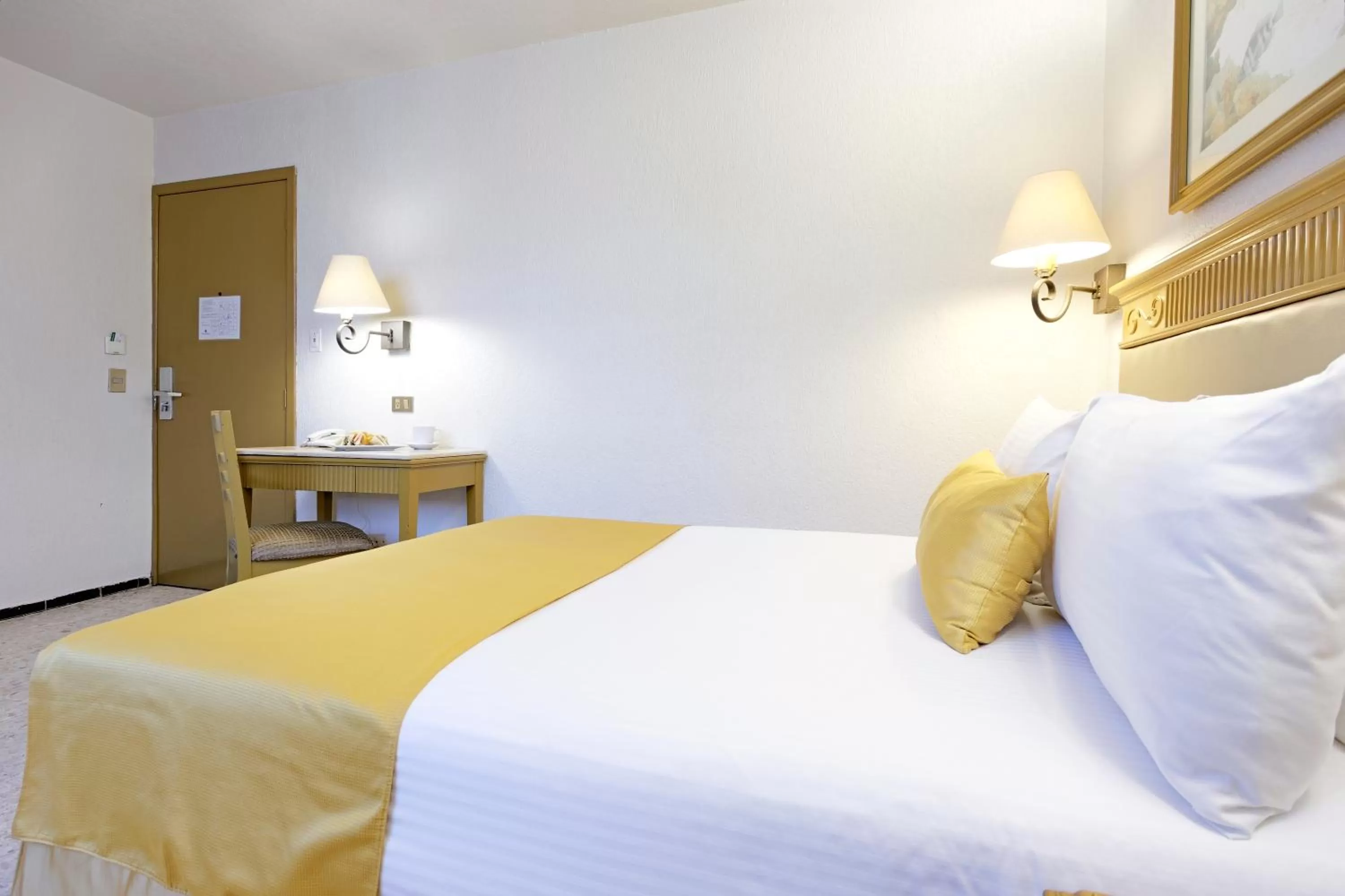 Bed in Hotel Olmeca Plaza