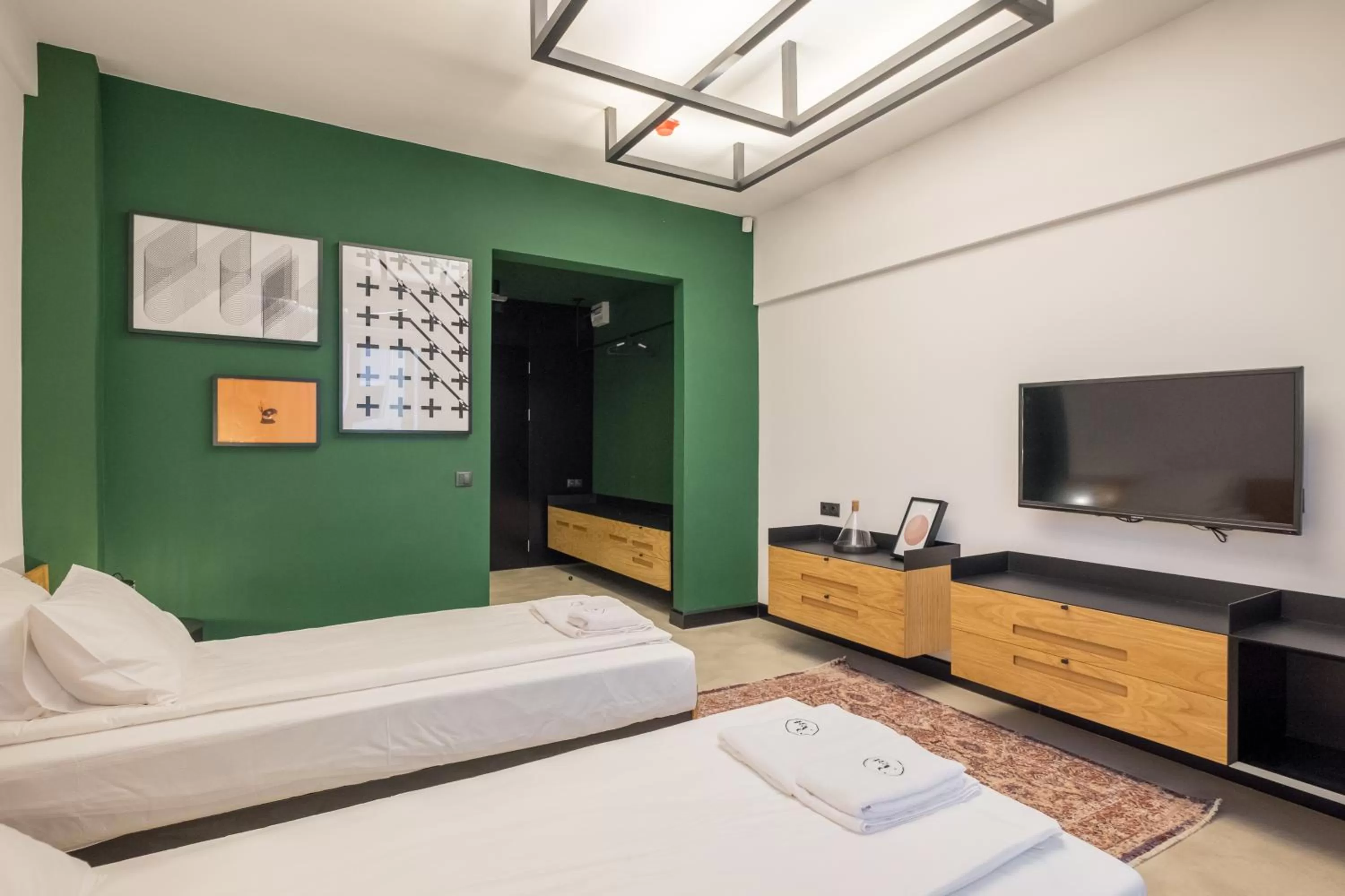 Bed in R34 Boutique Hotel