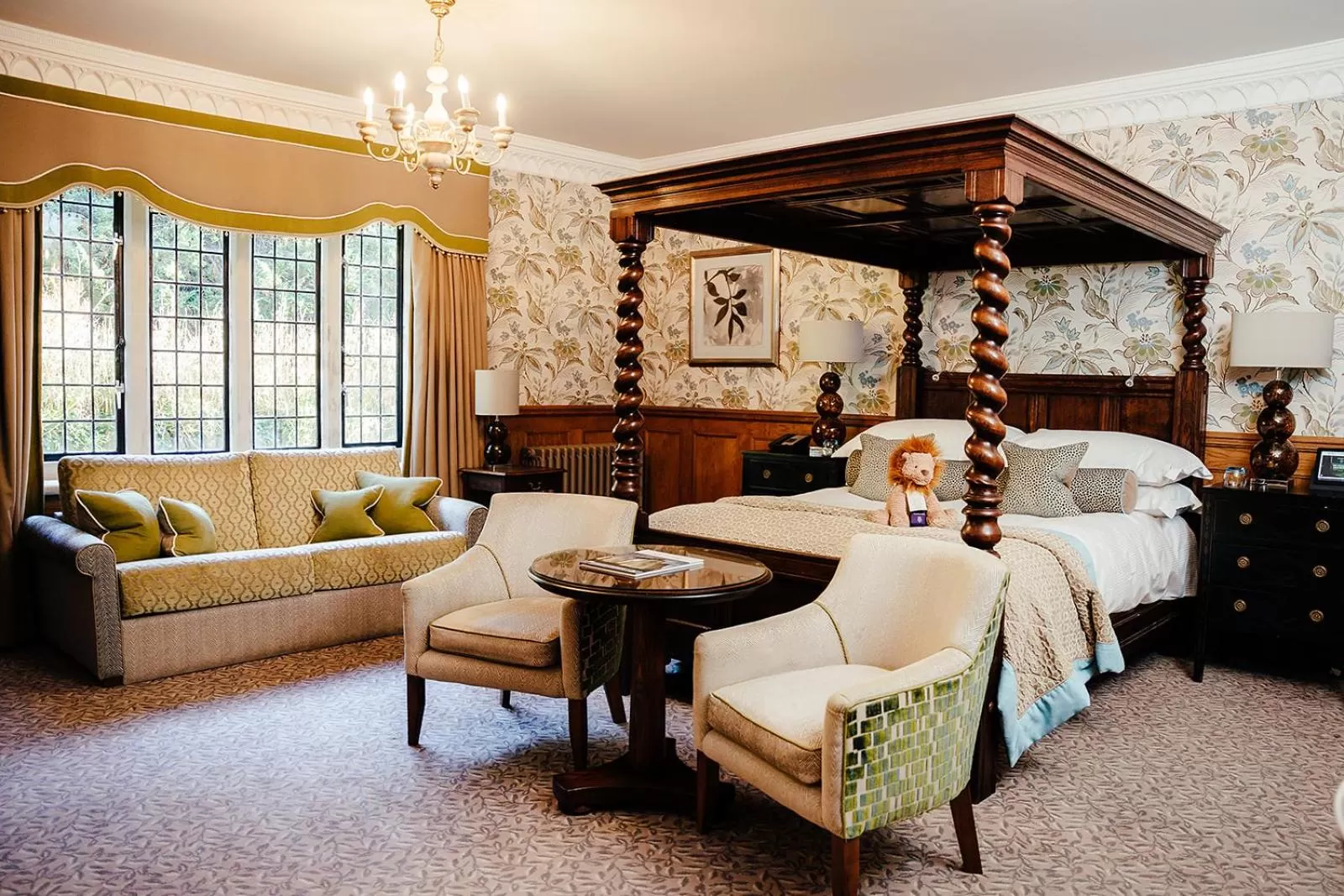 Bed, Seating Area in The Manor House Hotel and Golf Club