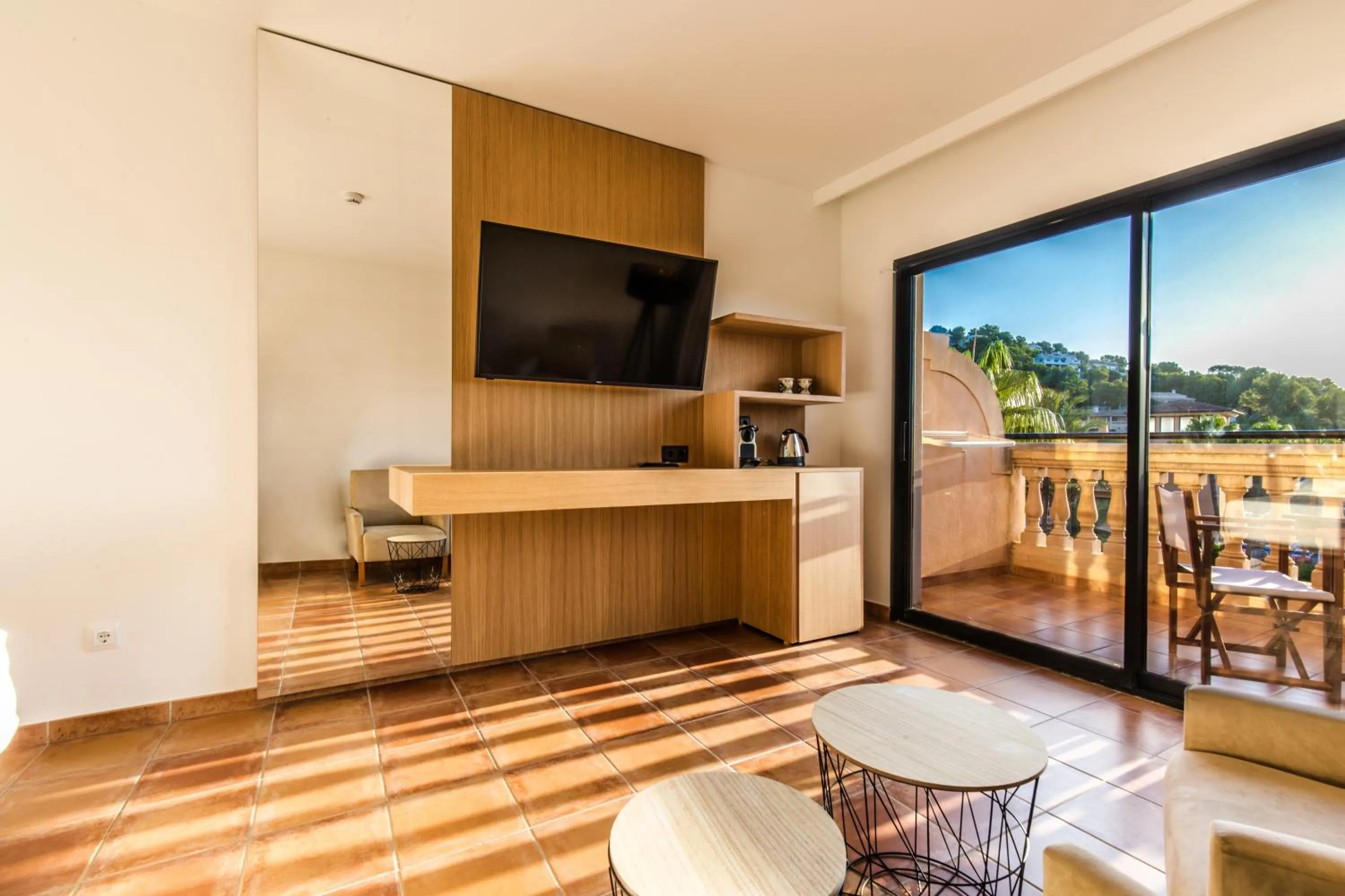 Communal lounge/ TV room in Mon Port Hotel & Spa