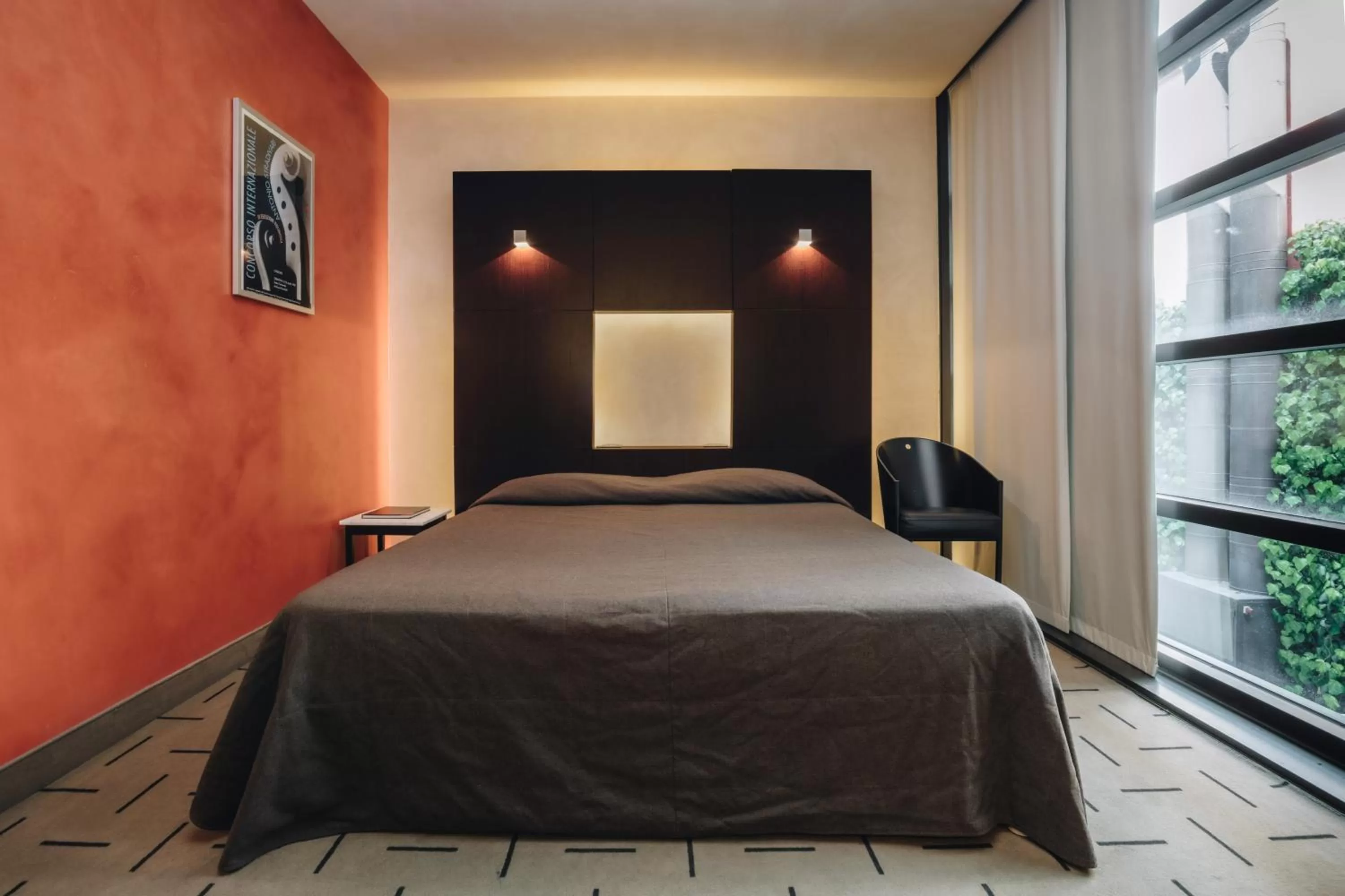 Bed in DelleArti Design Hotel
