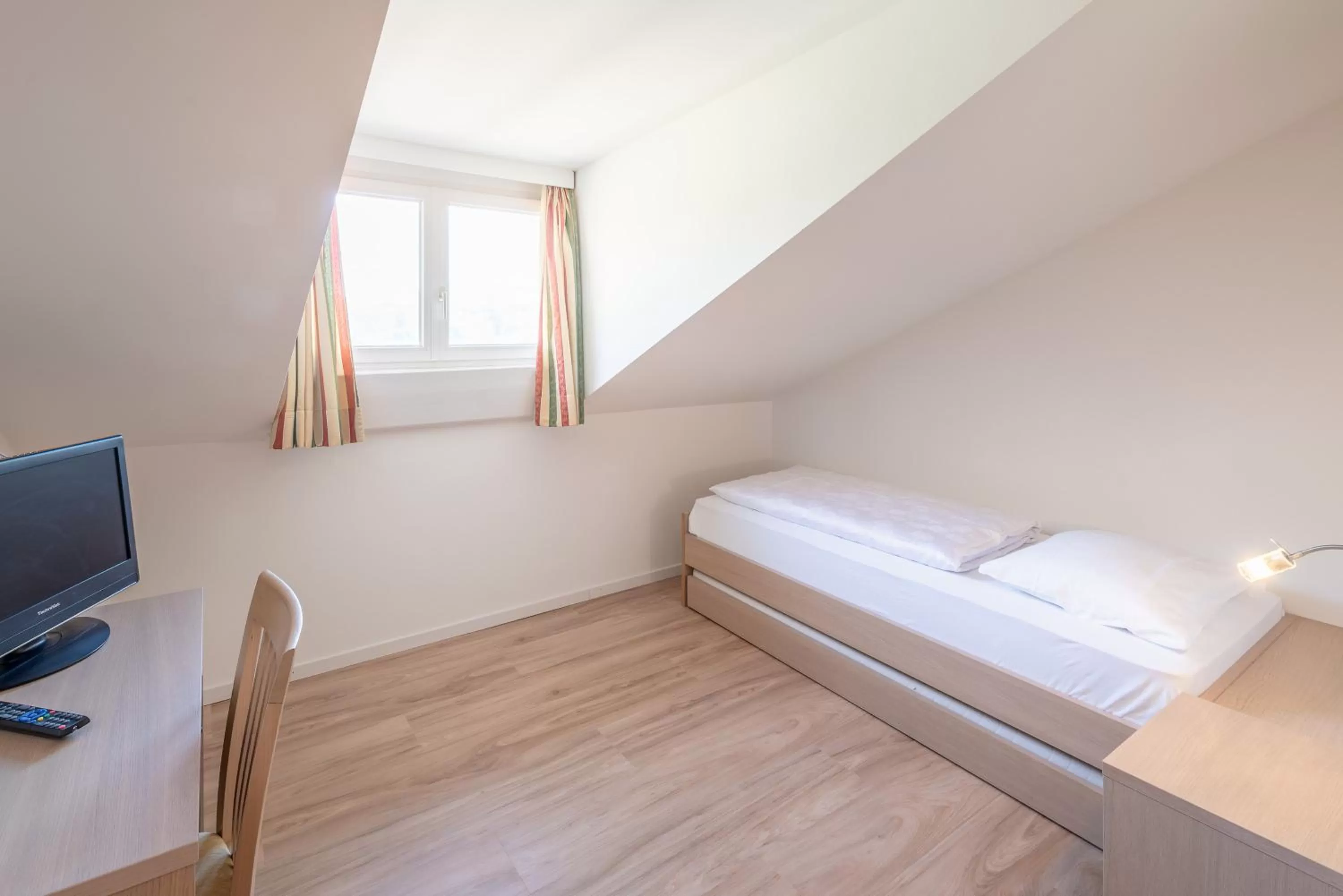 Photo of the whole room, Bed in Garni Hotel Ritterhof