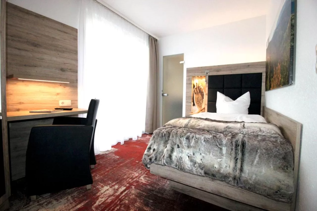 Photo of the whole room, Bed in Wellness & Ayurveda Hotel Am Eichenberg